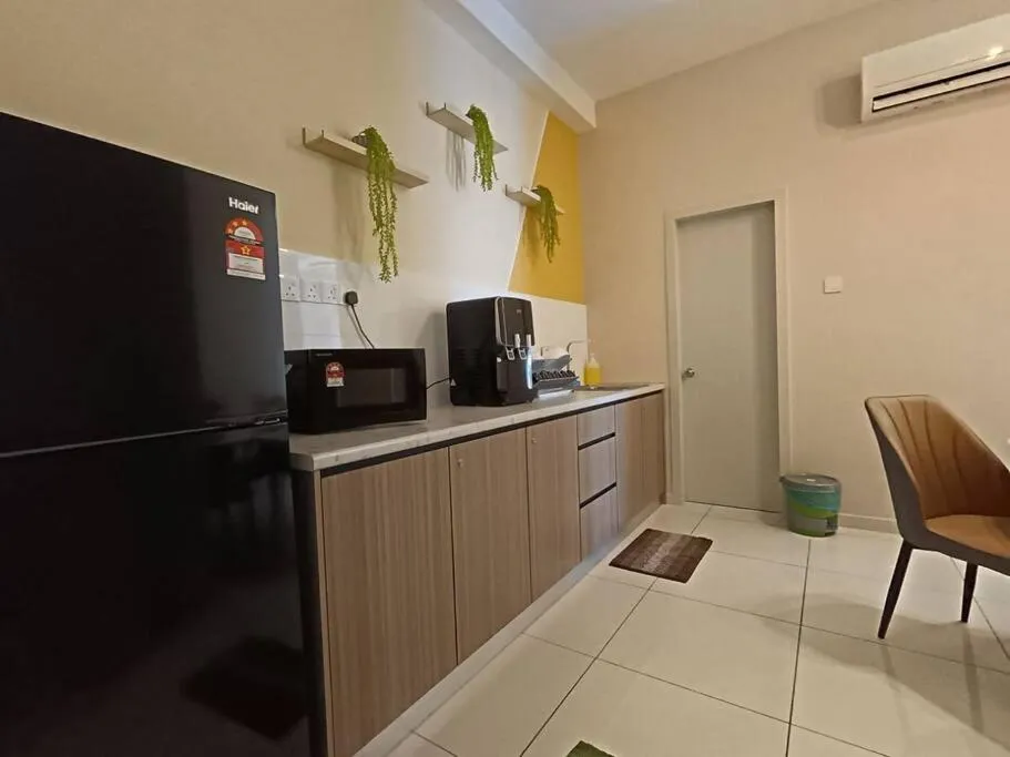 Kitchen or kitchenette in The Horizon Ipoh Dual L13 by Grab A Stay