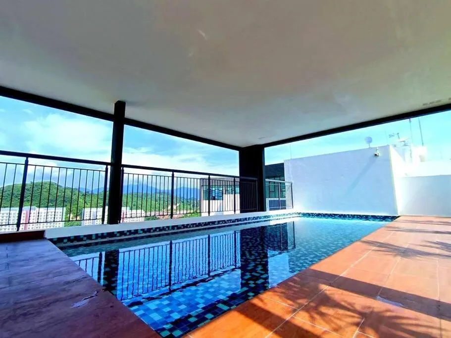 Swimming pool in The Horizon Ipoh Dual L13 by Grab A Stay