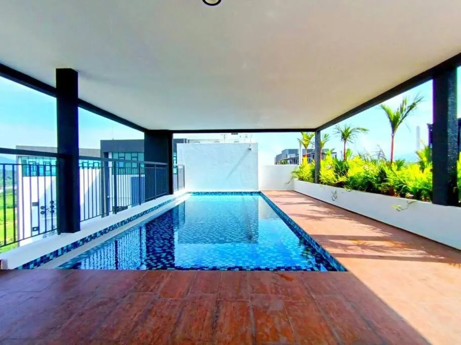 Swimming pool in The Horizon Ipoh Dual L13 by Grab A Stay