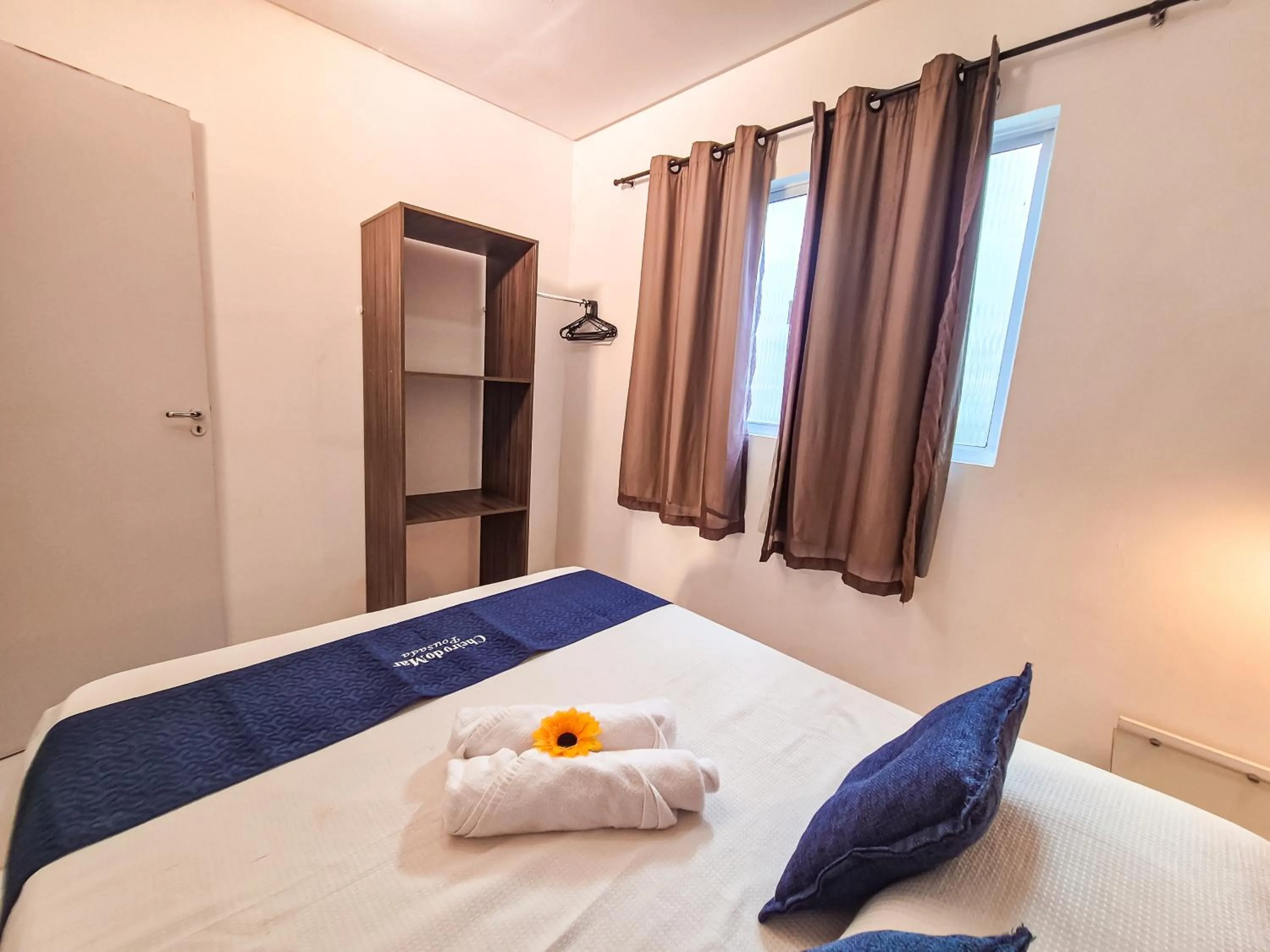 Bed in Pousada Cheiro do Mar