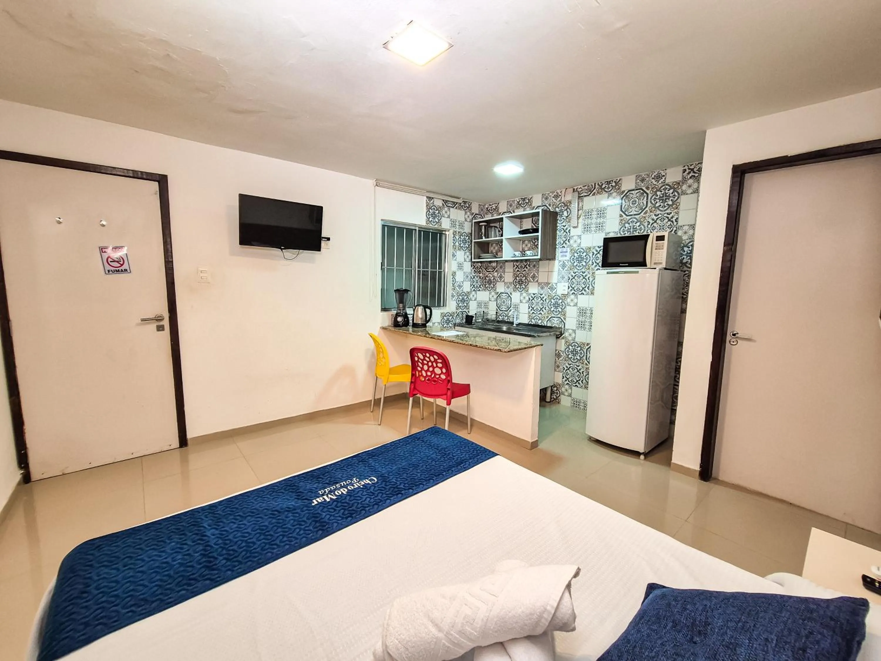 Bed in Pousada Cheiro do Mar