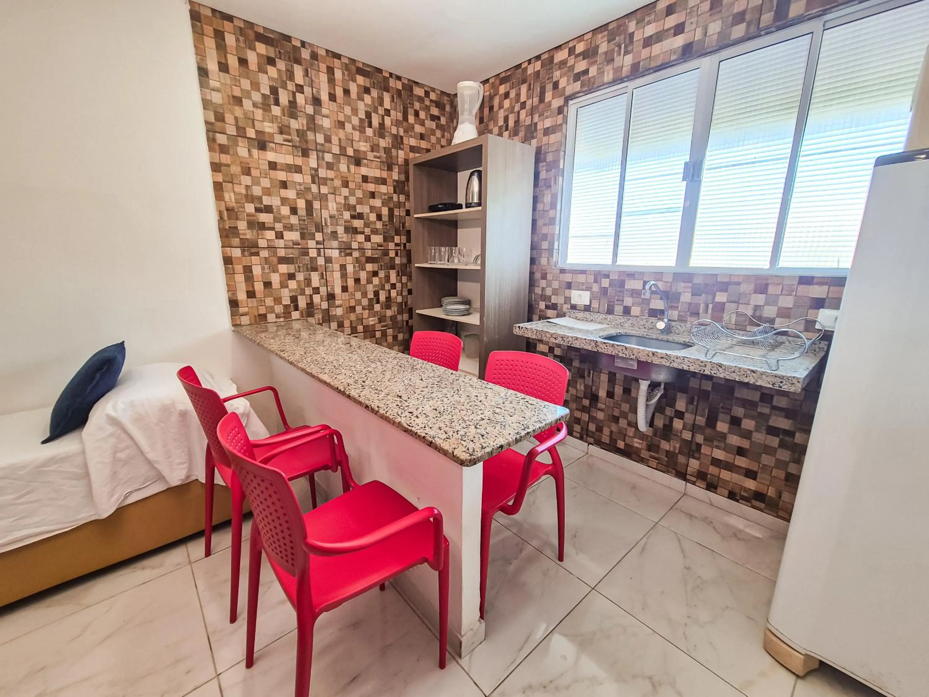 Kitchen or kitchenette in Pousada Cheiro do Mar