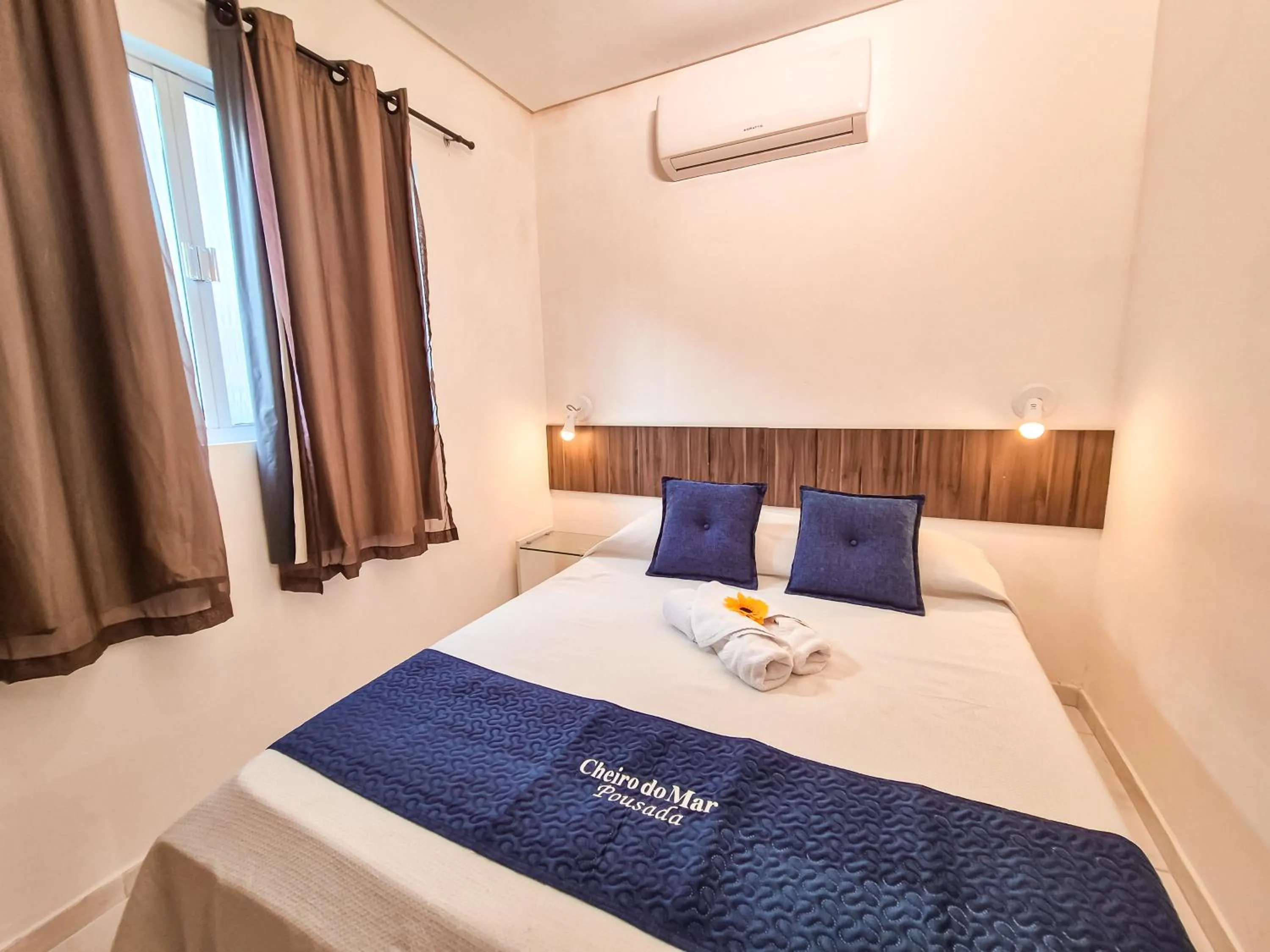 Bed in Pousada Cheiro do Mar