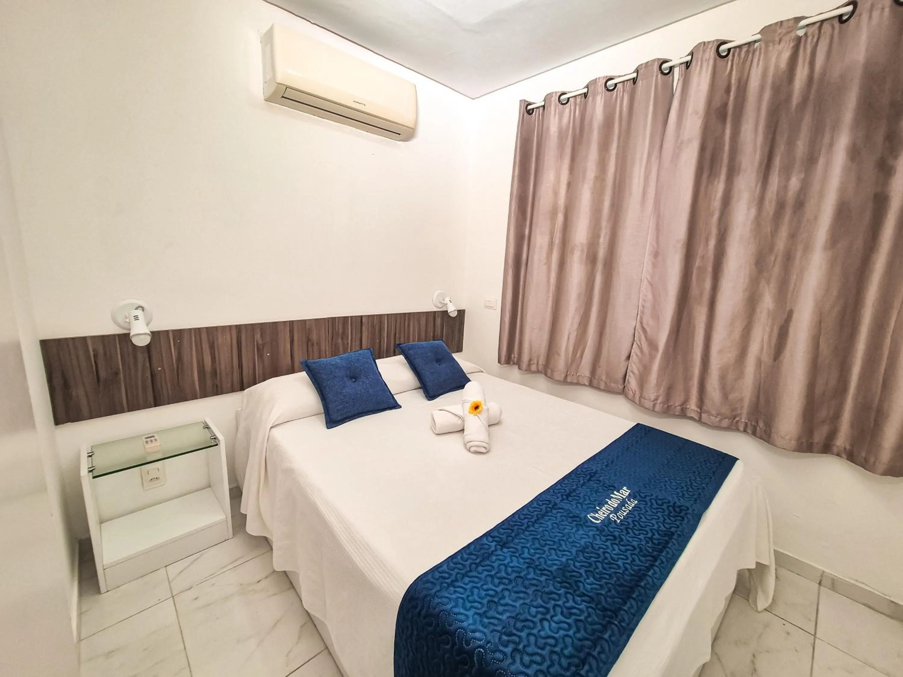 Bed in Pousada Cheiro do Mar