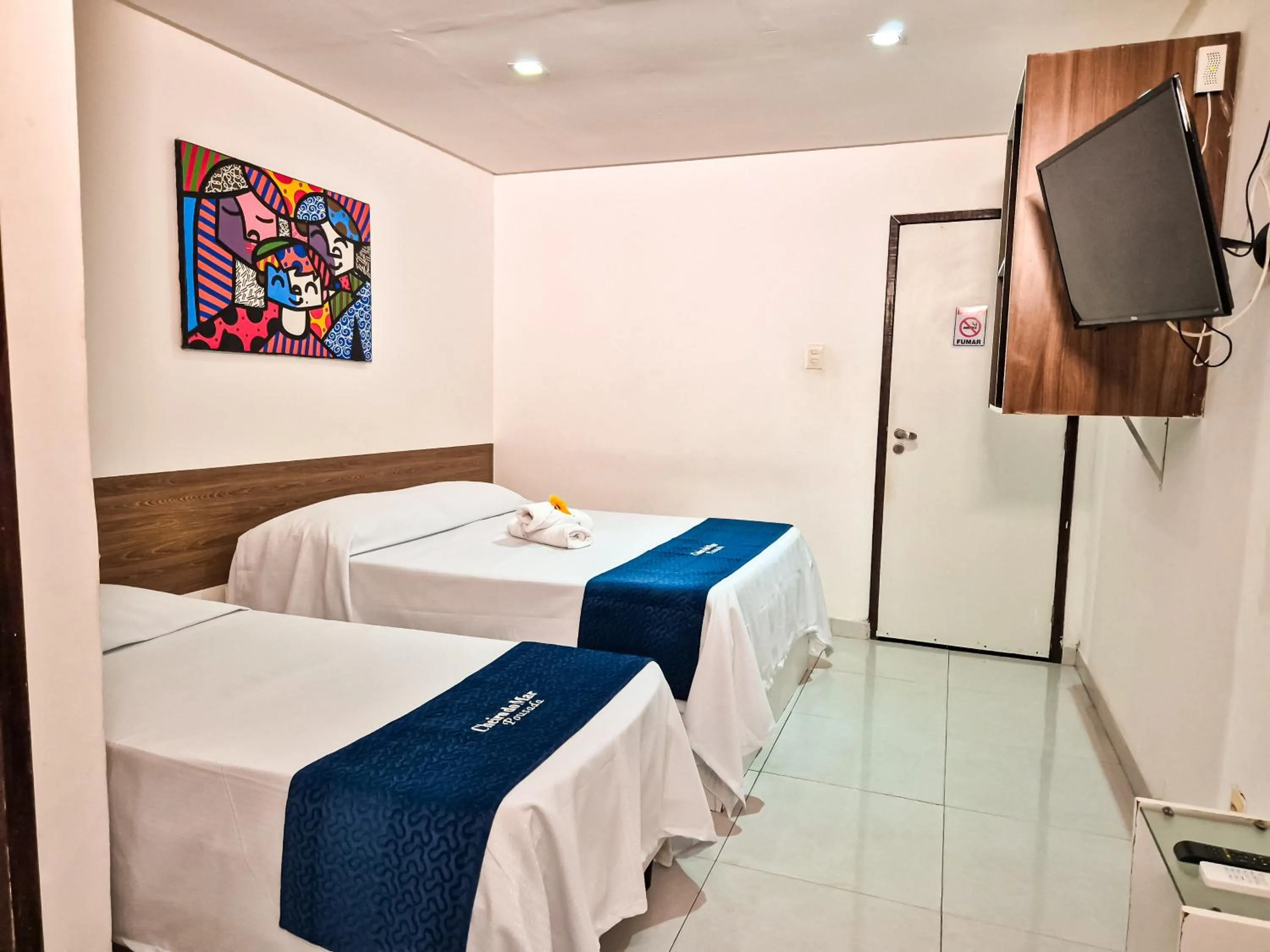 Bed in Pousada Cheiro do Mar