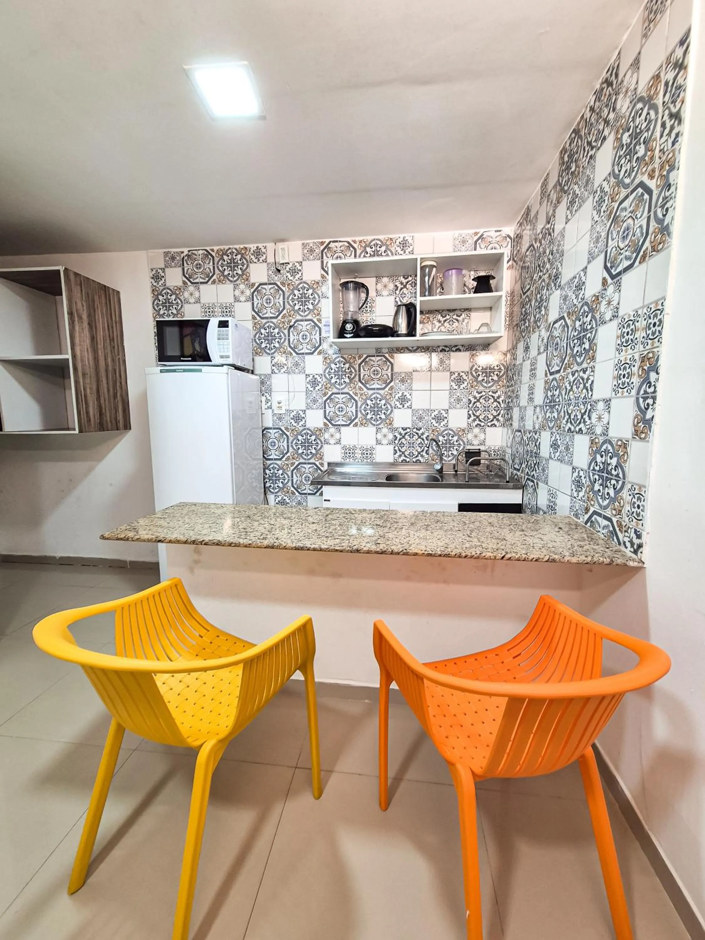 Kitchen or kitchenette in Pousada Cheiro do Mar