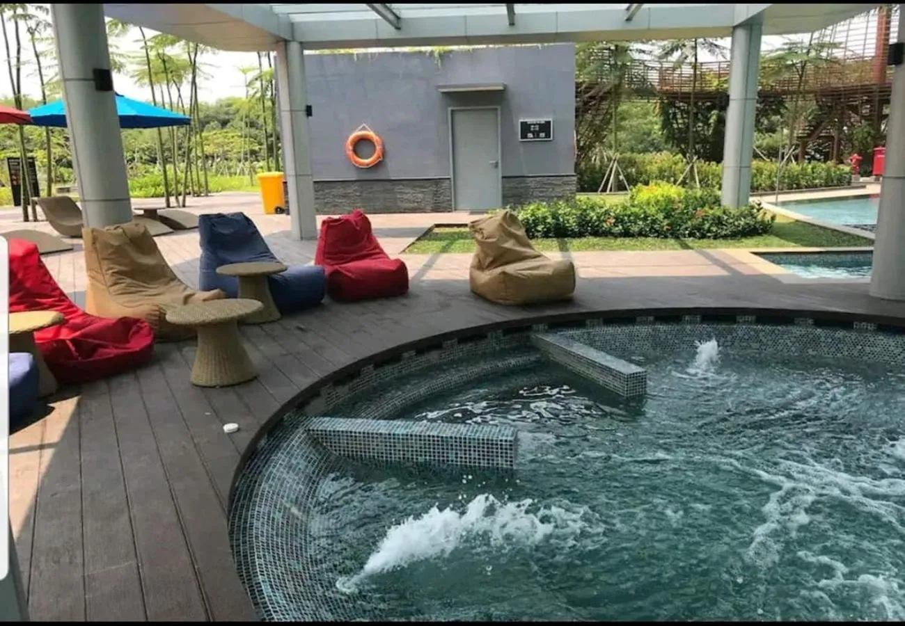 Swimming pool in Comfort and Luxury Private Room at Goldcoast PIK
