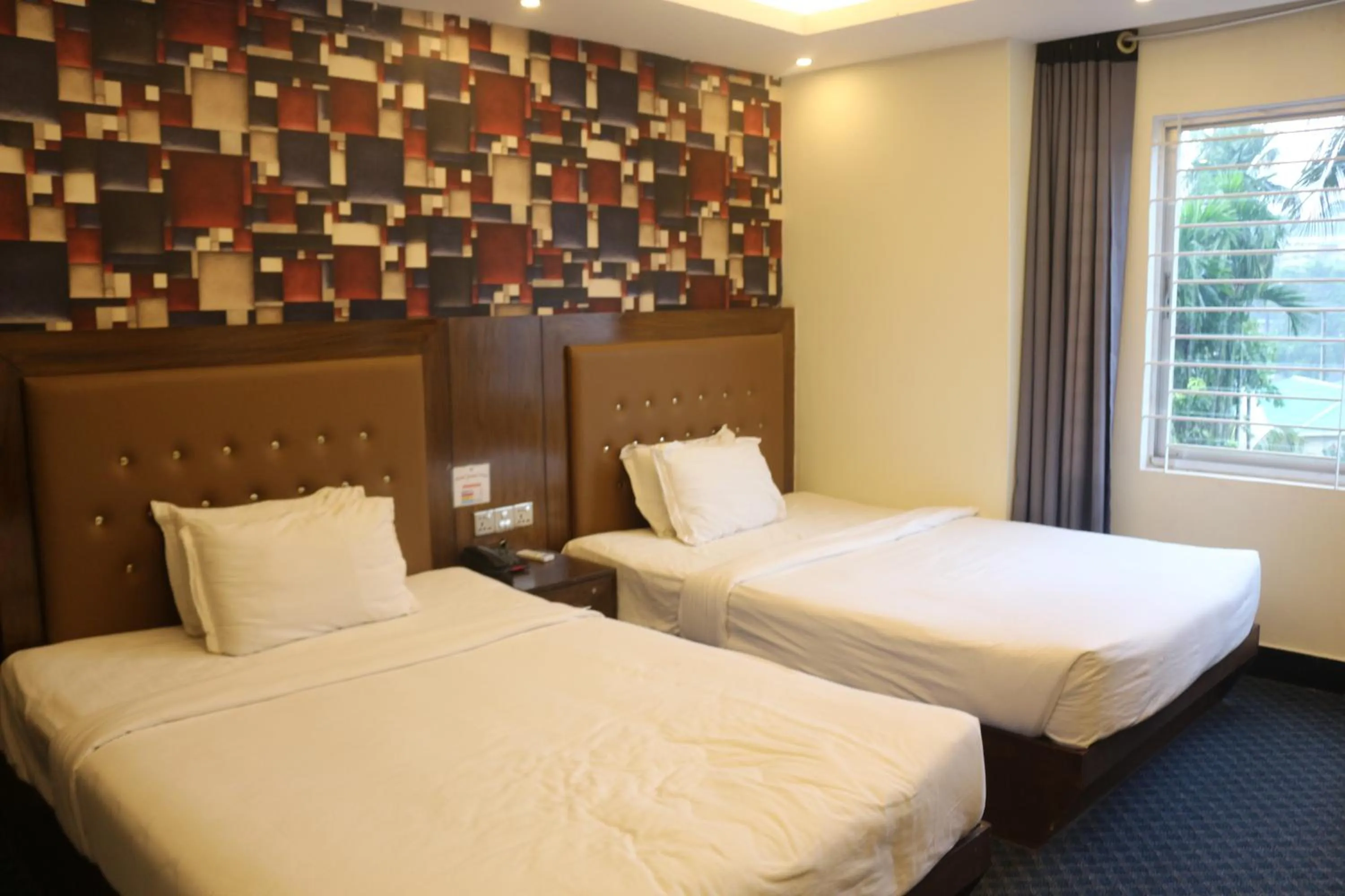 Bed in New Hotel Grand View