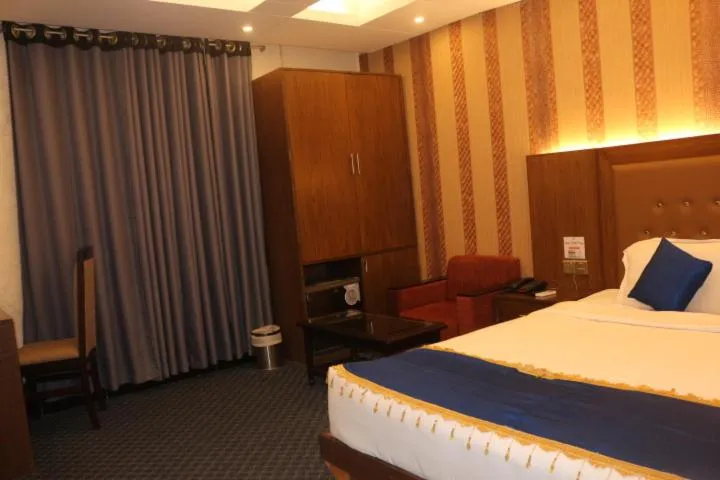 Bed in New Hotel Grand View