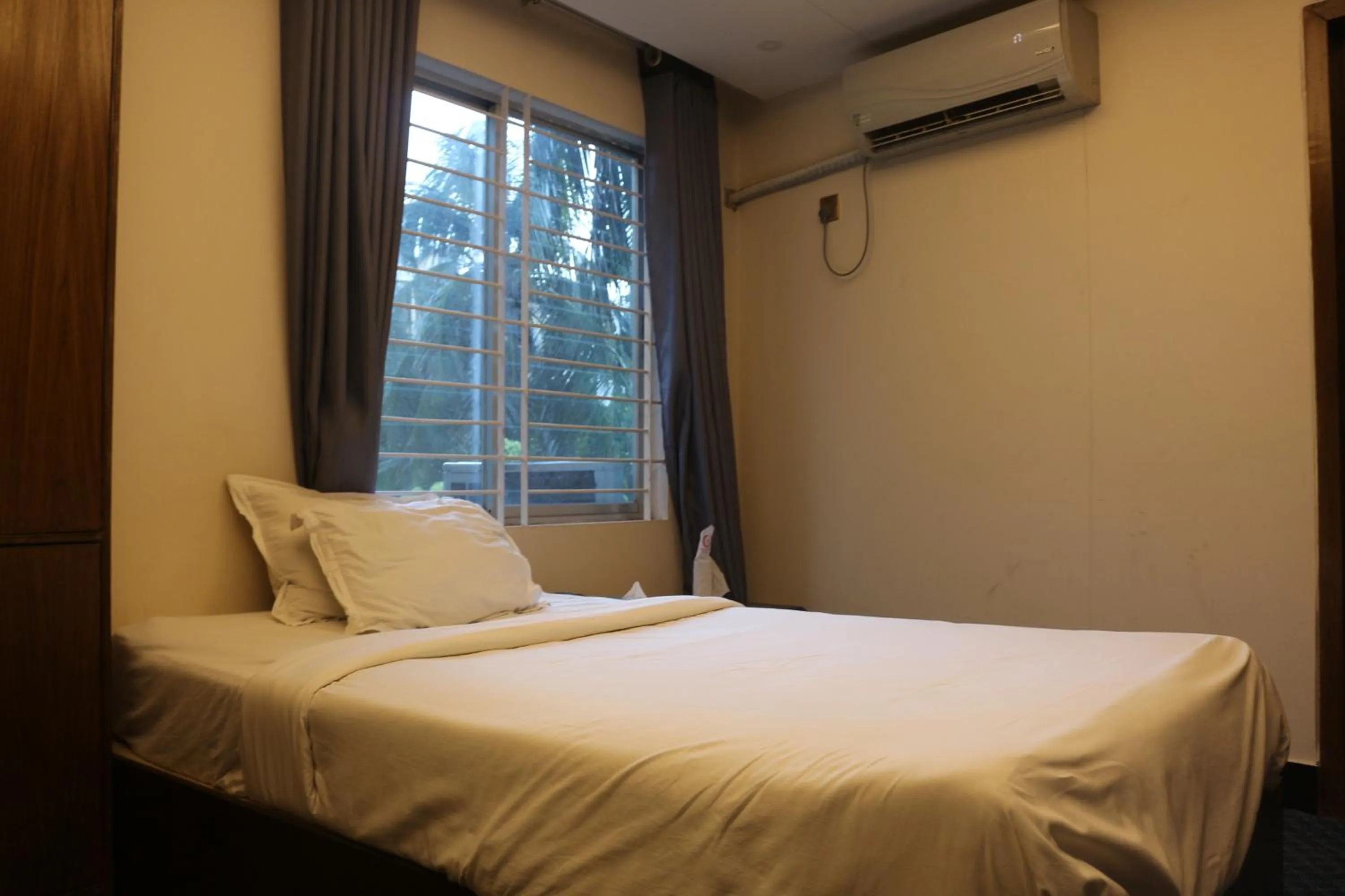 Bed in New Hotel Grand View