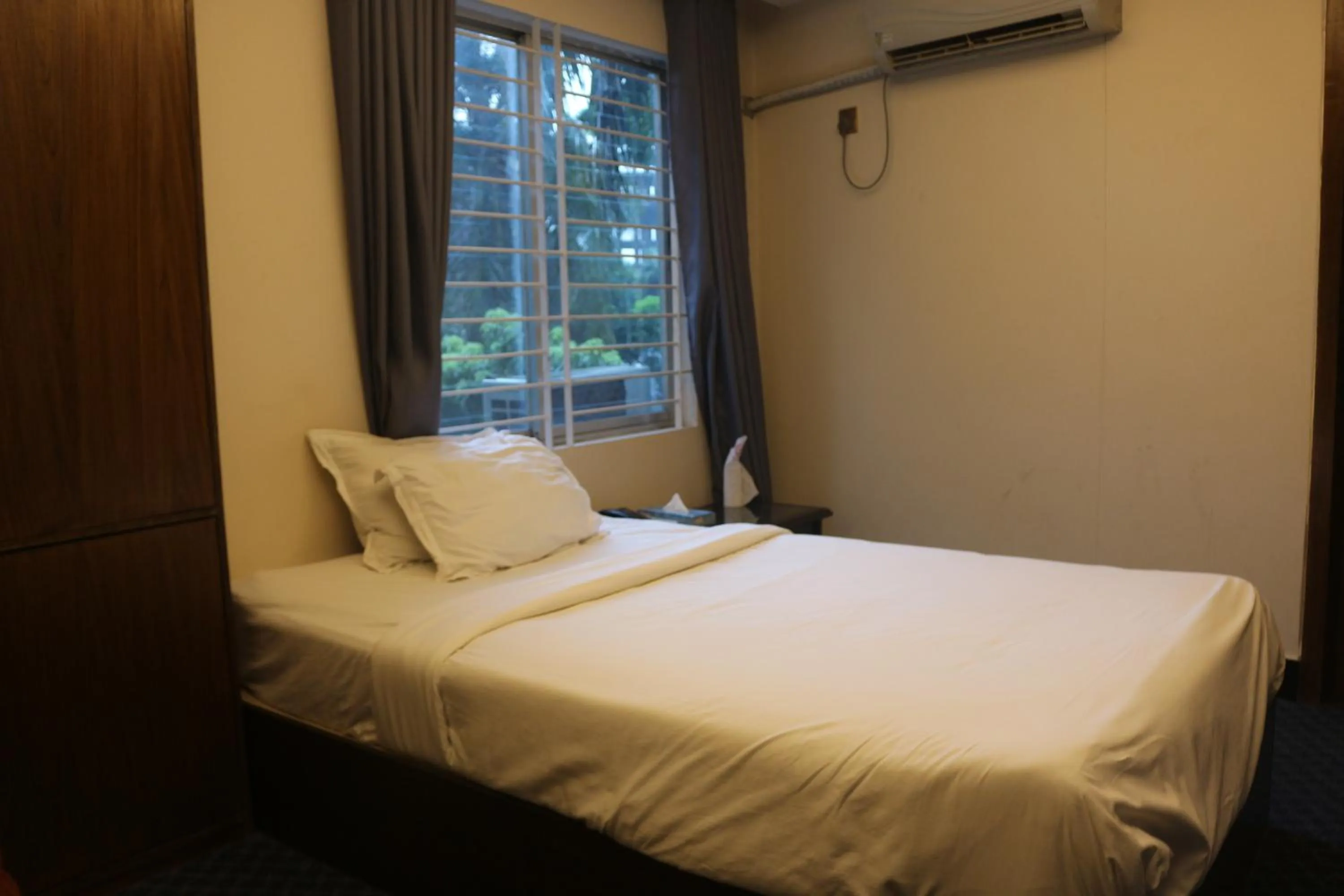 Bed in New Hotel Grand View