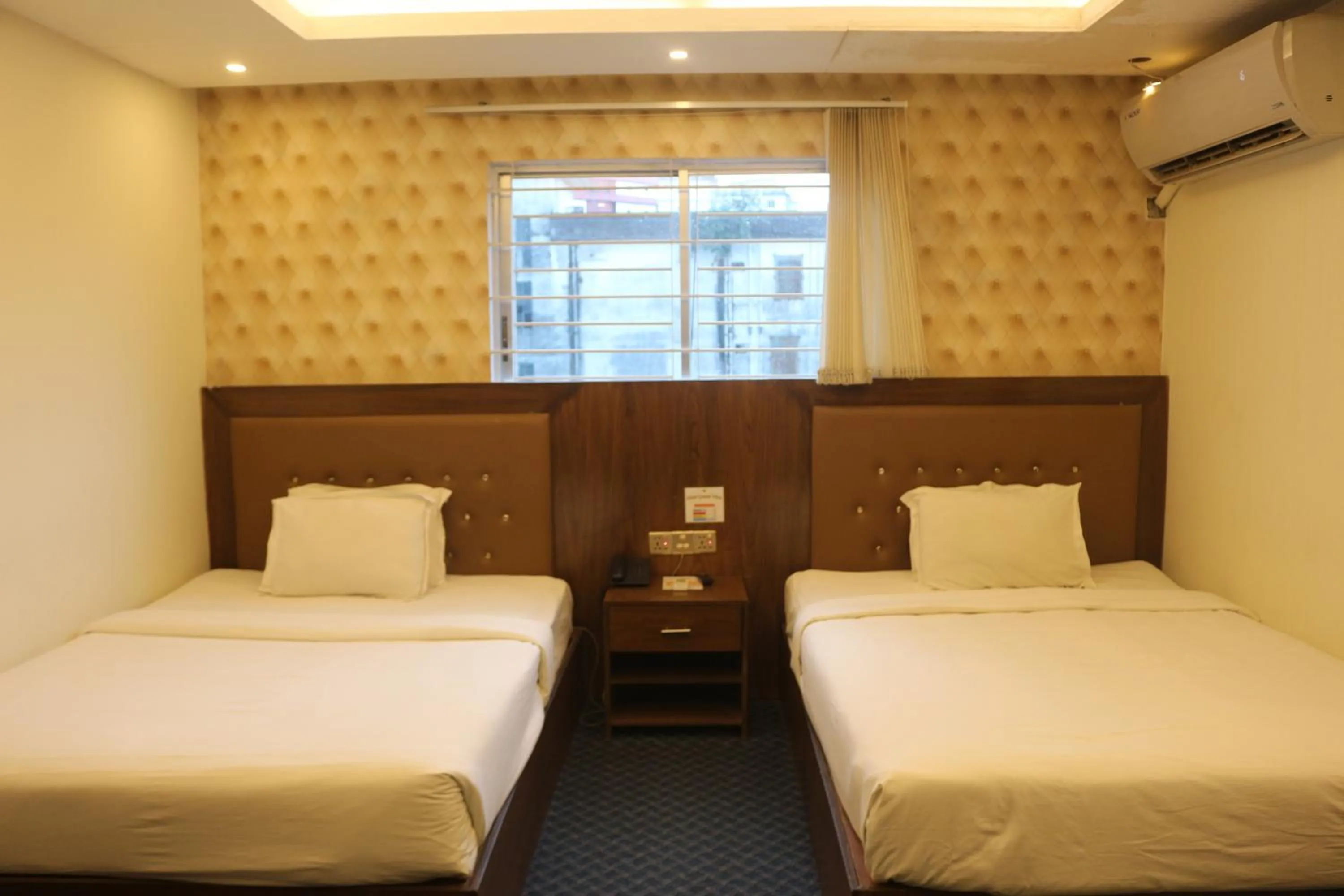 Bed in New Hotel Grand View