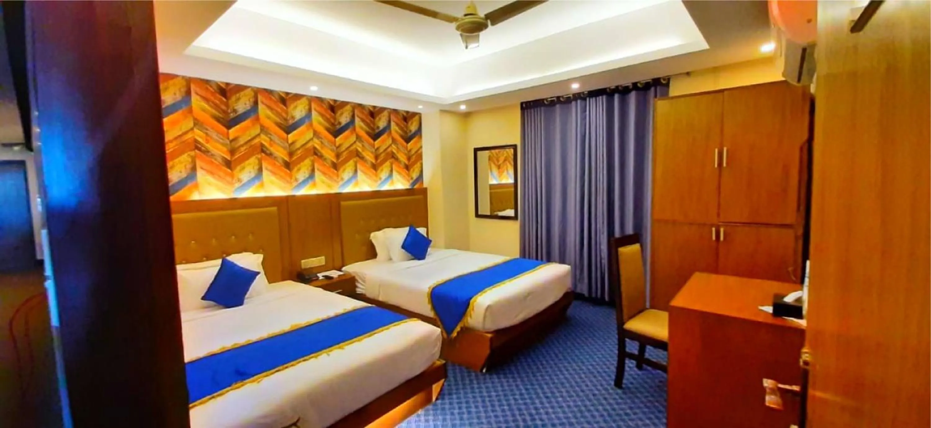 TV and multimedia, Bed in New Hotel Grand View