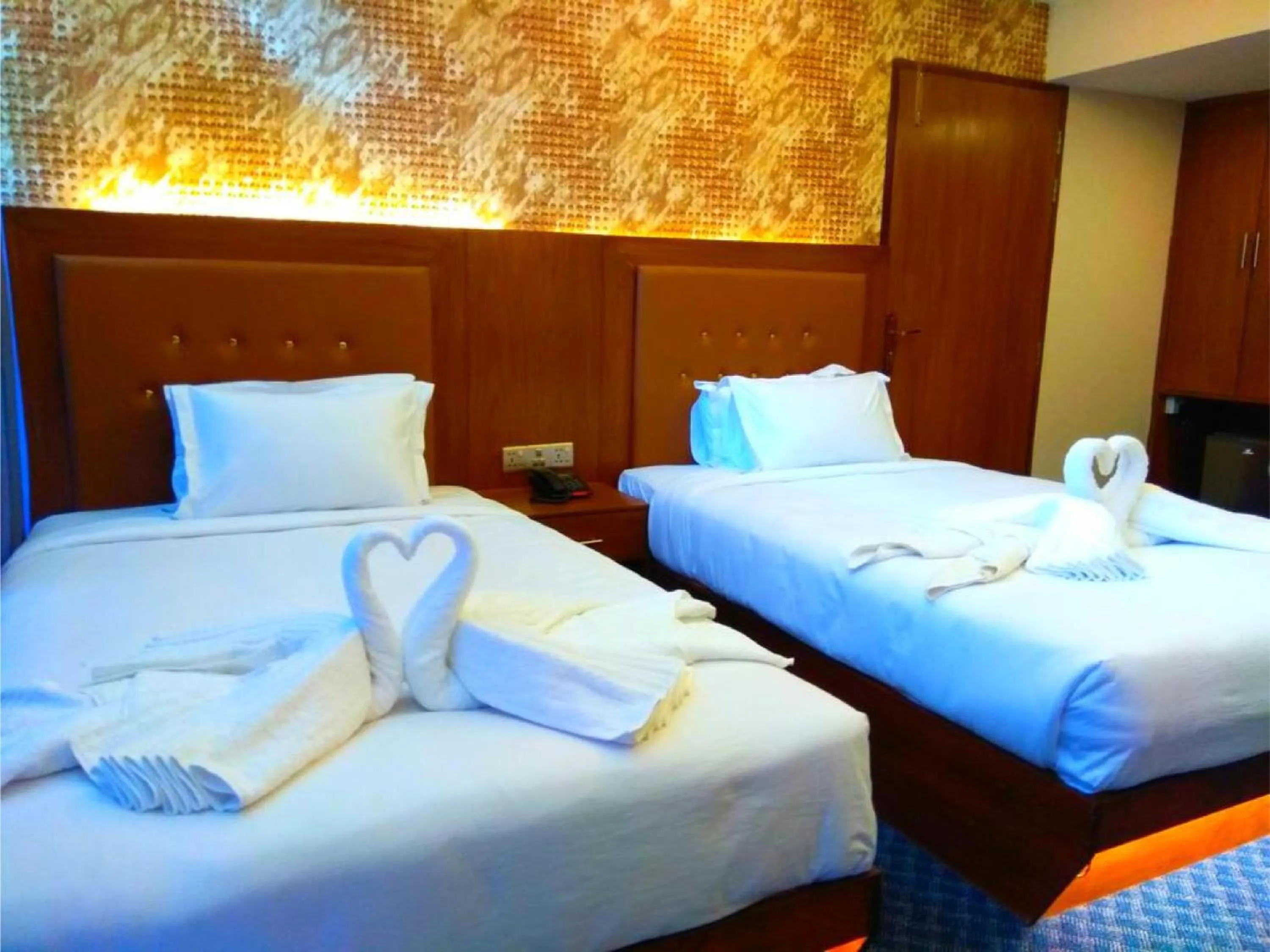 Bed in New Hotel Grand View