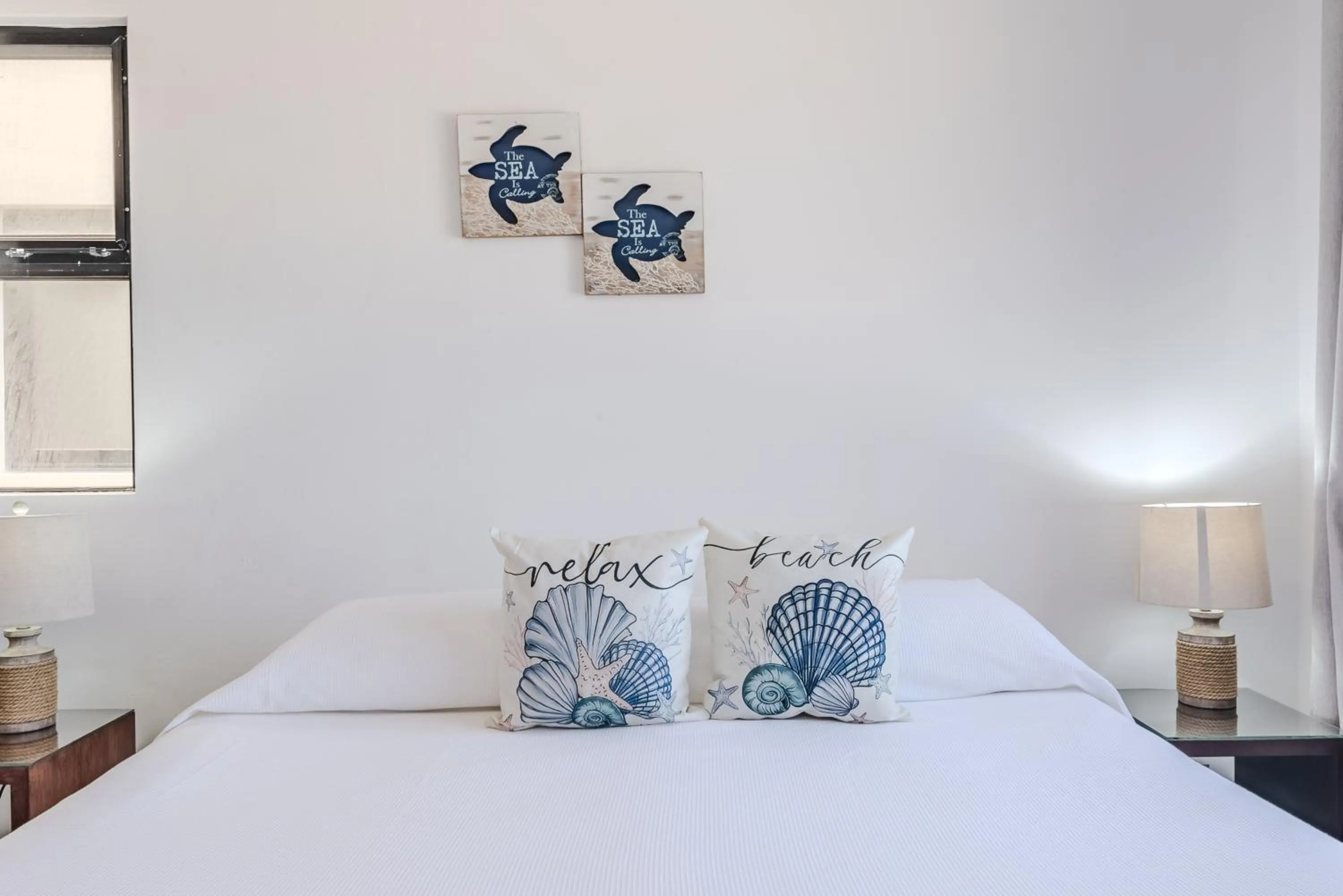 Bed in Vela's Condos Ocean Front