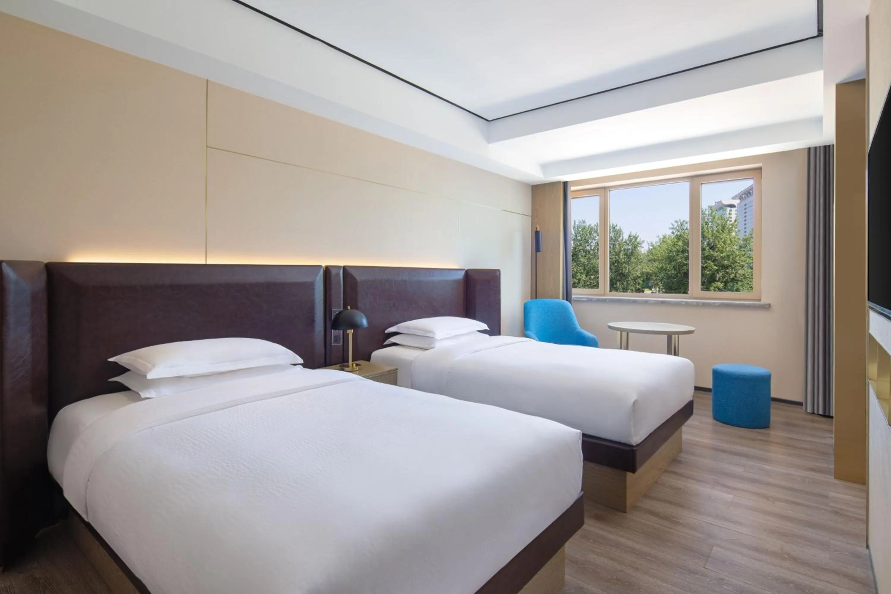 Photo of the whole room, Bed in Fairfield by Marriott Beijing Olympic Sports Center