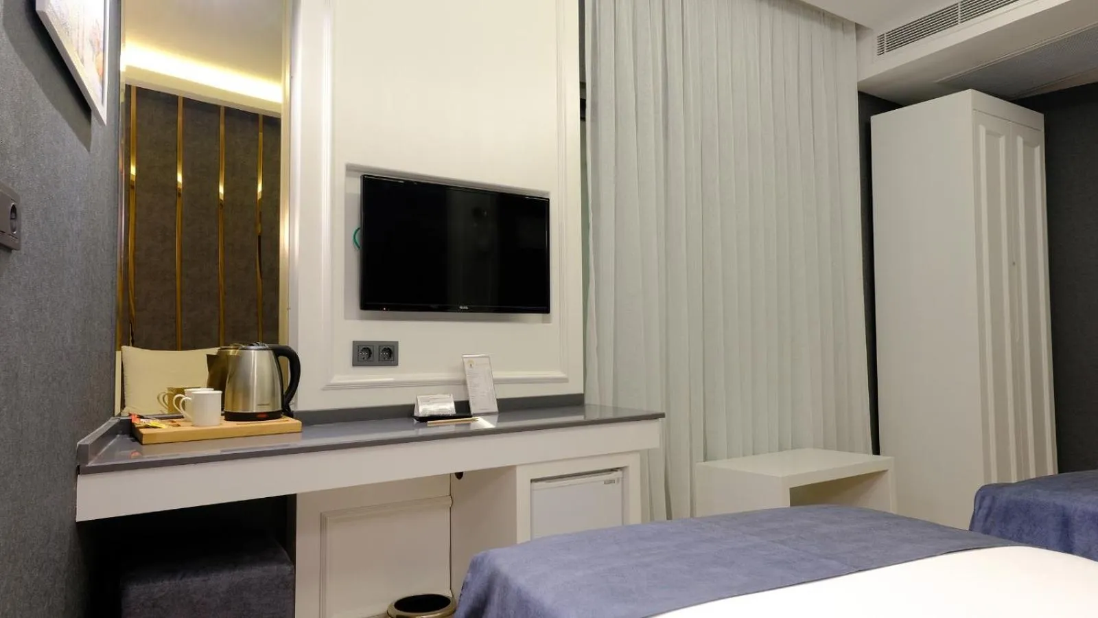 TV and multimedia, Bed in Mai İnci Otel