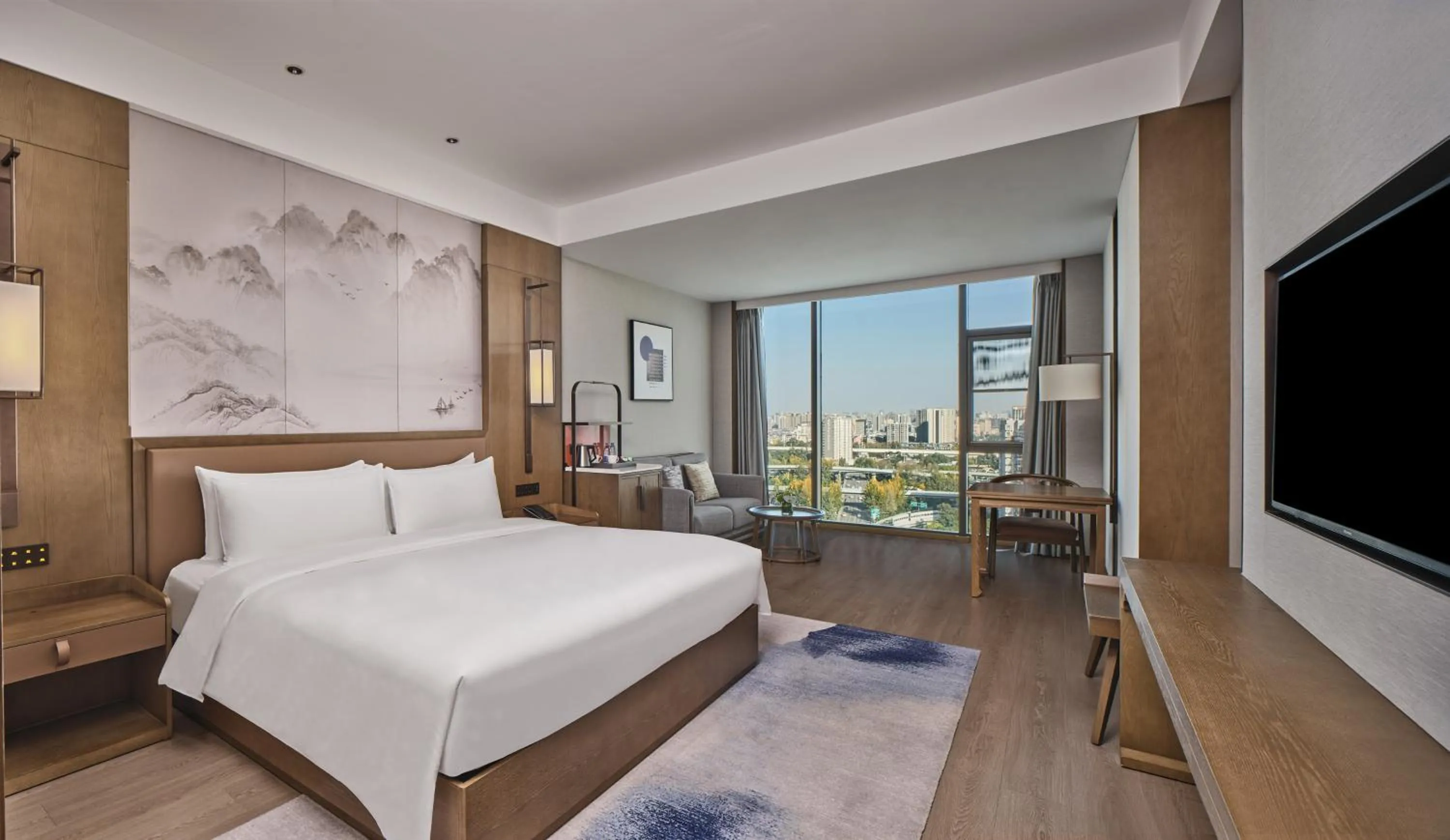 Bed in Crowne Plaza Chengdu Wuhou by IHG