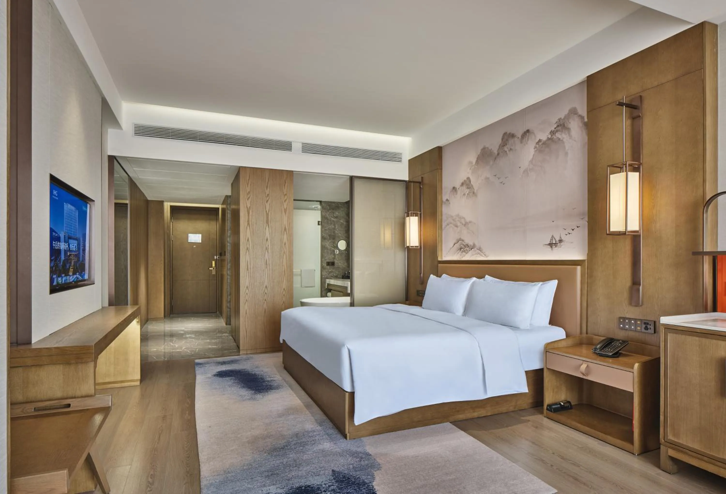 Bed in Crowne Plaza Chengdu Wuhou by IHG