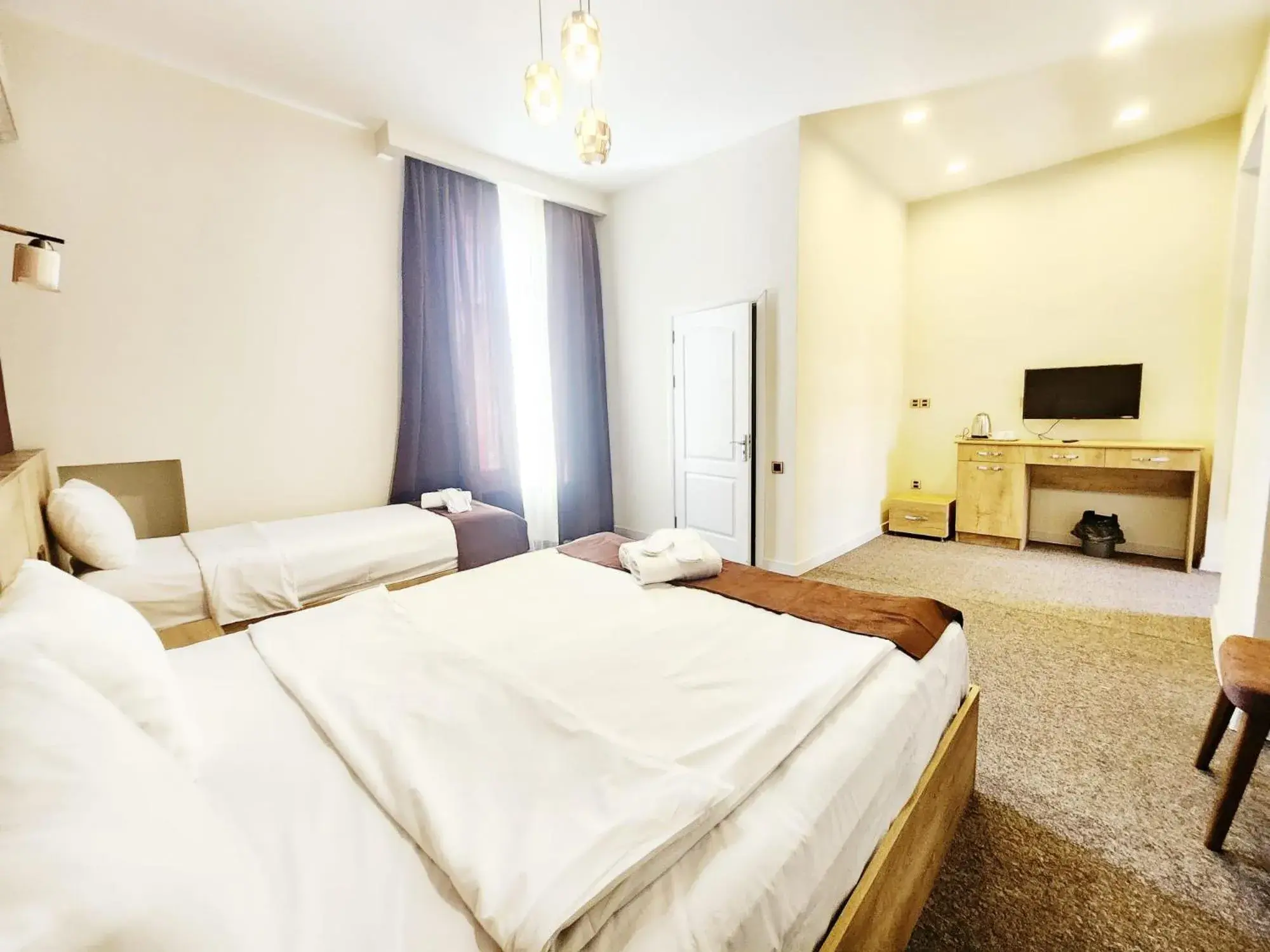 Triple Room in ELYSIUM HOTEL Triple Room in ELYSIUM HOTEL