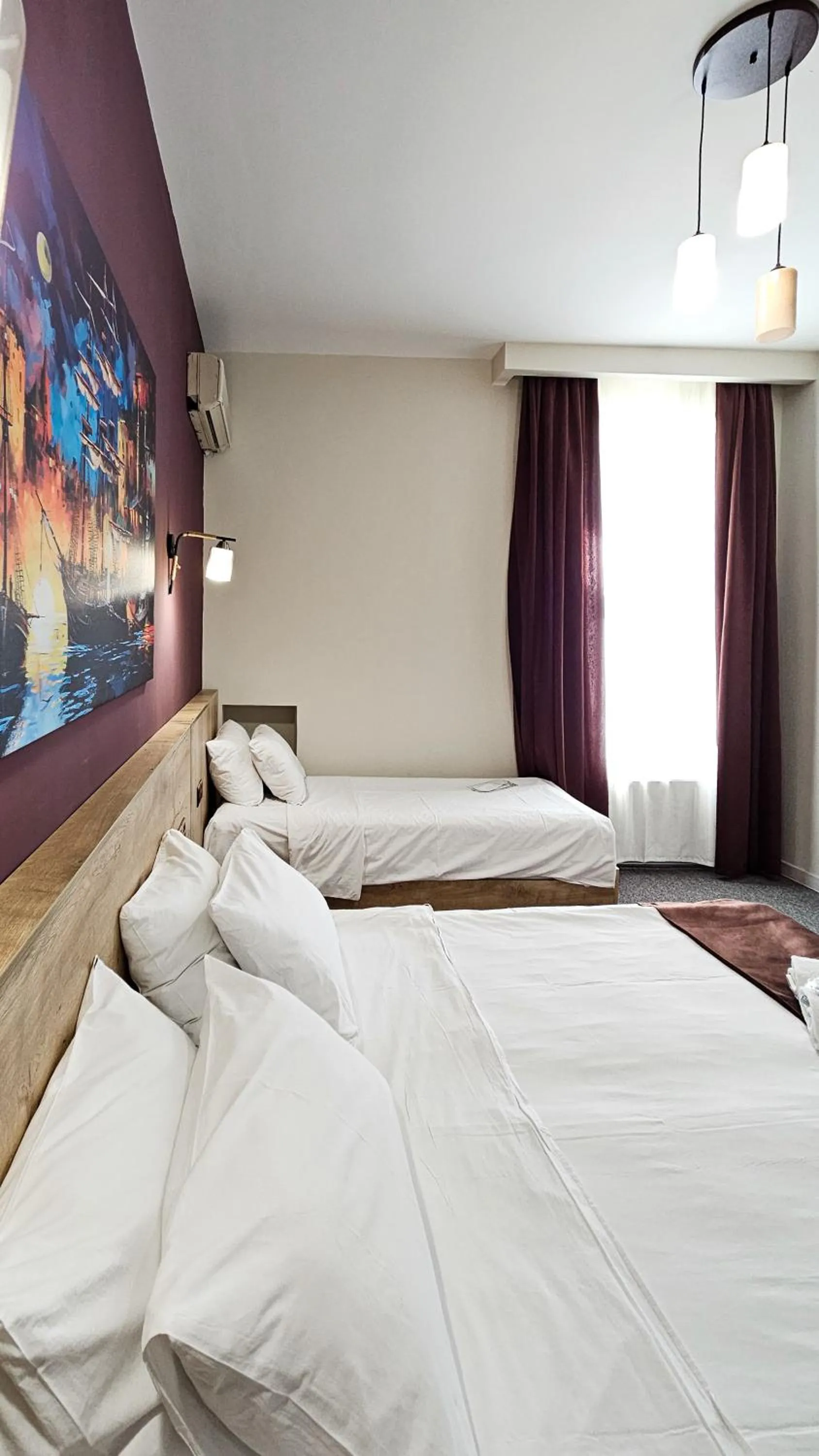 Photo of the whole room, Bed in ELYSIUM HOTEL