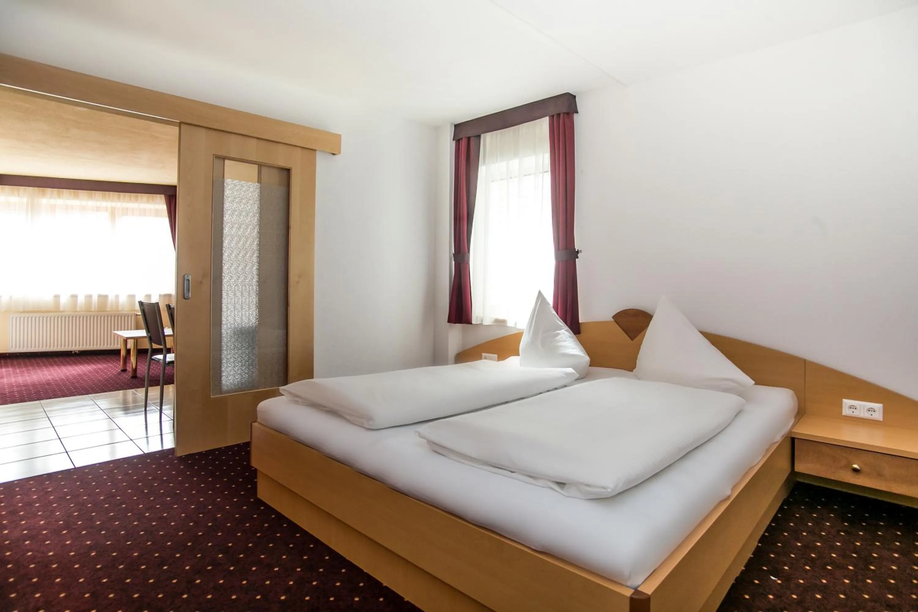 Living room, Bed in Hotel Tia Monte Nauders