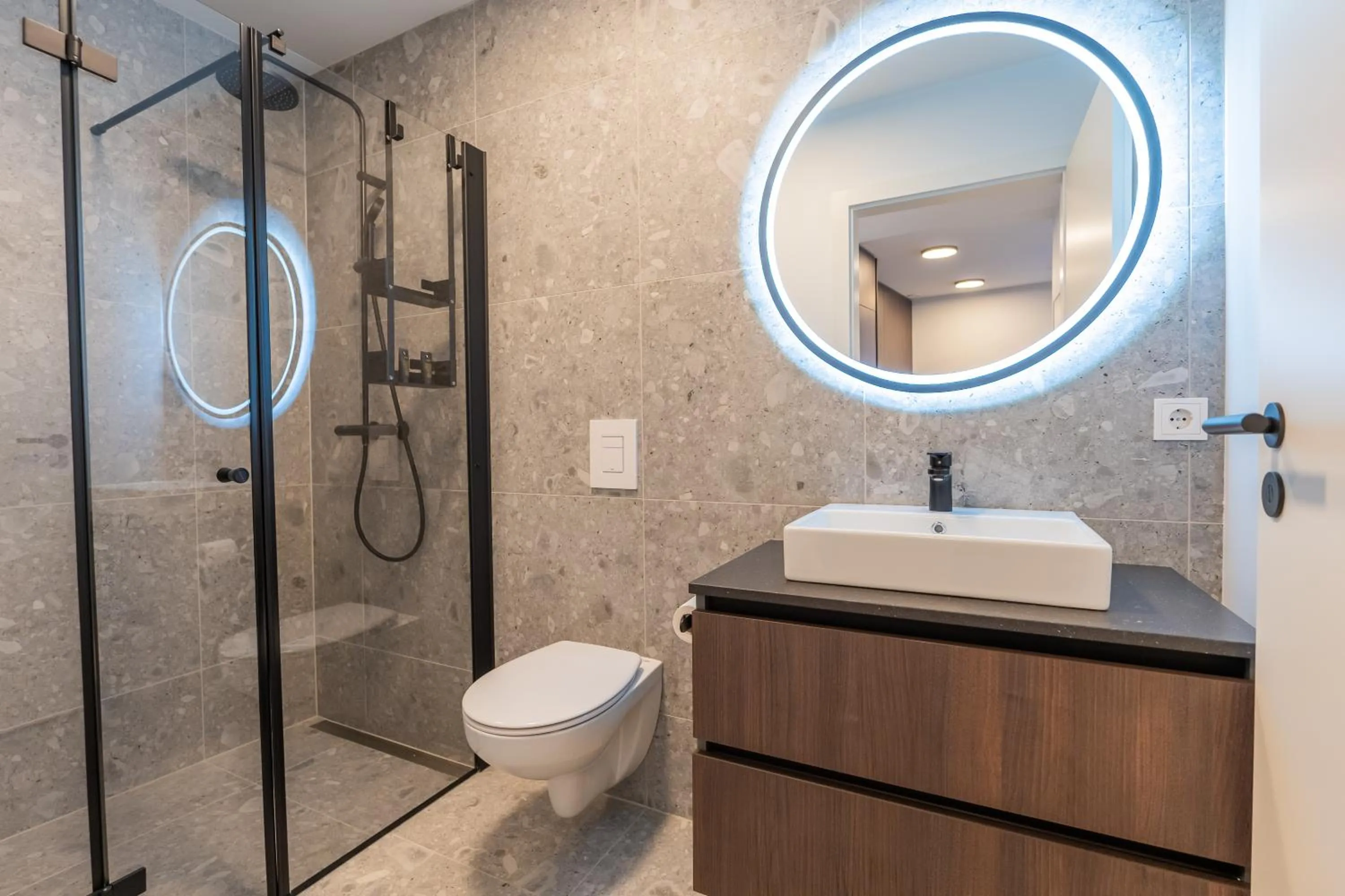 Shower in Hlemmur Suites