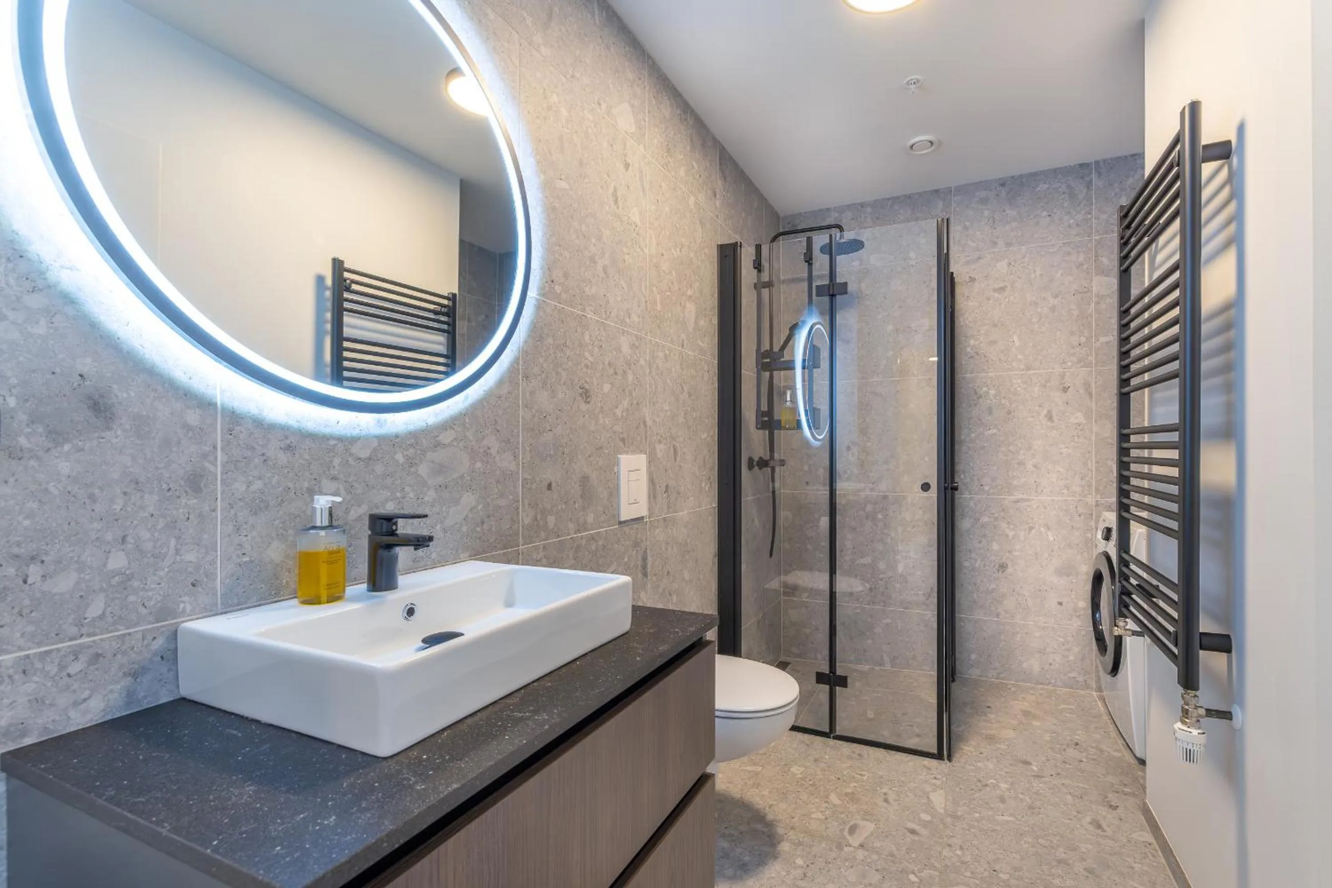 Shower in Hlemmur Suites