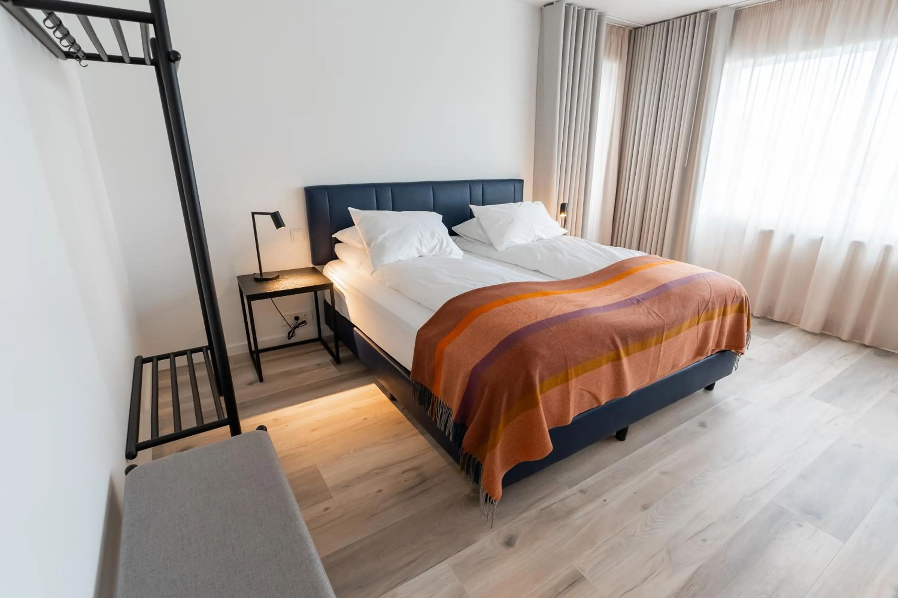 Bed in Hlemmur Suites