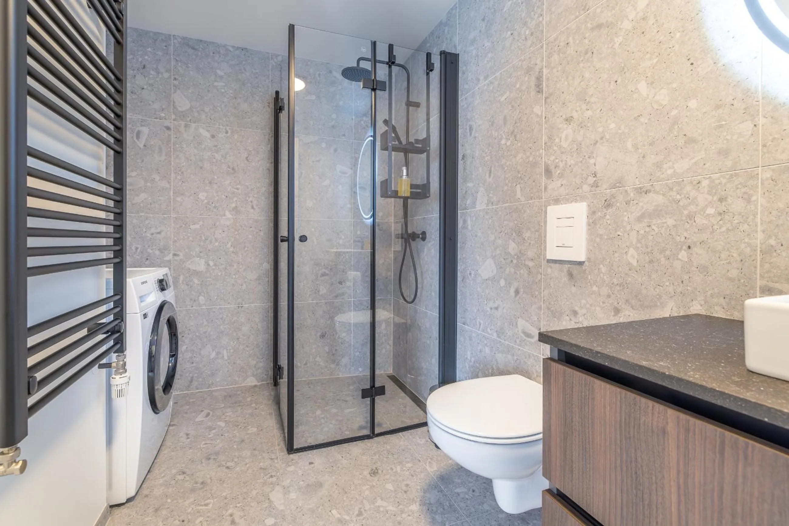 Shower in Hlemmur Suites