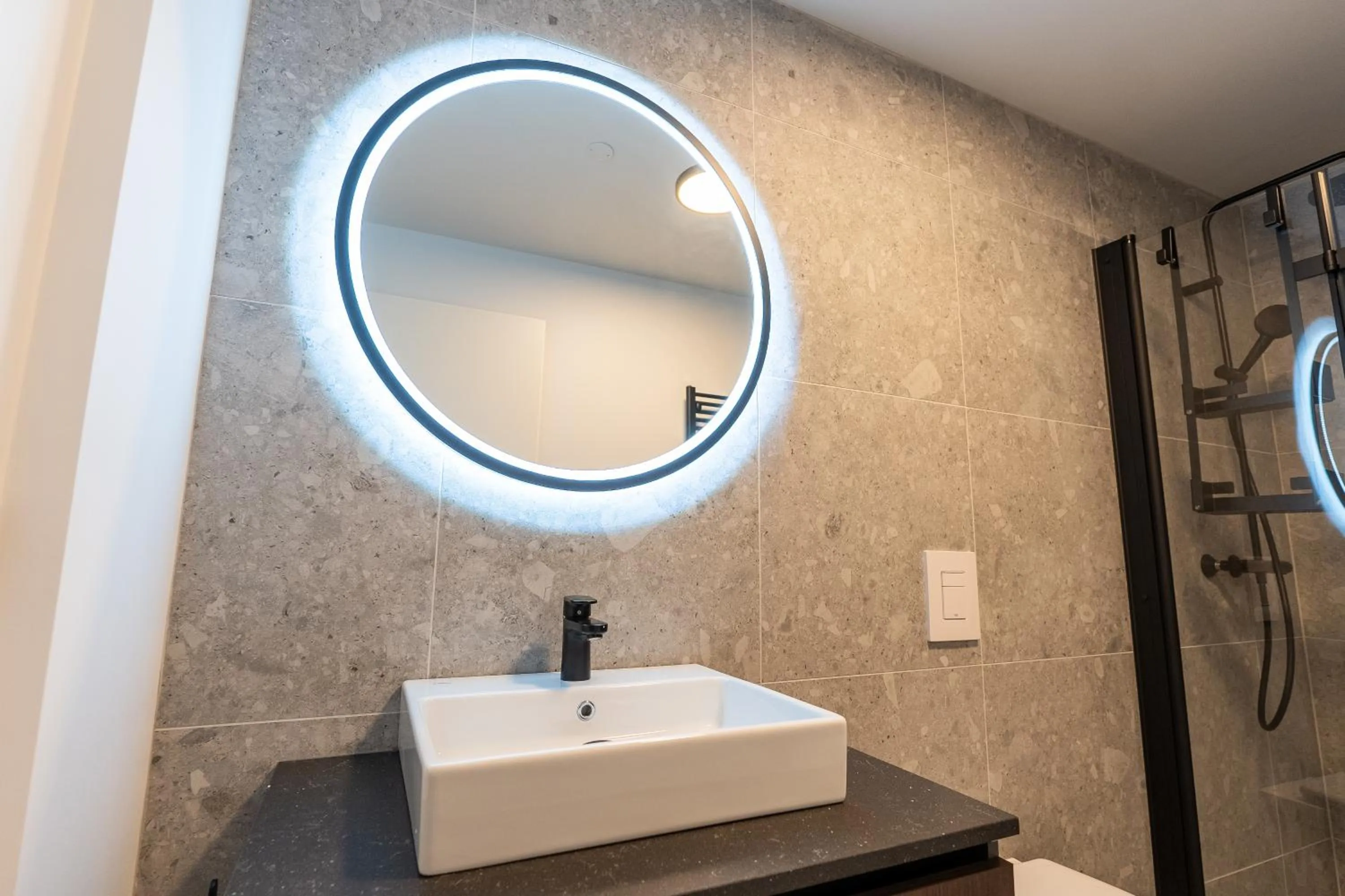 Bathroom in Hlemmur Suites