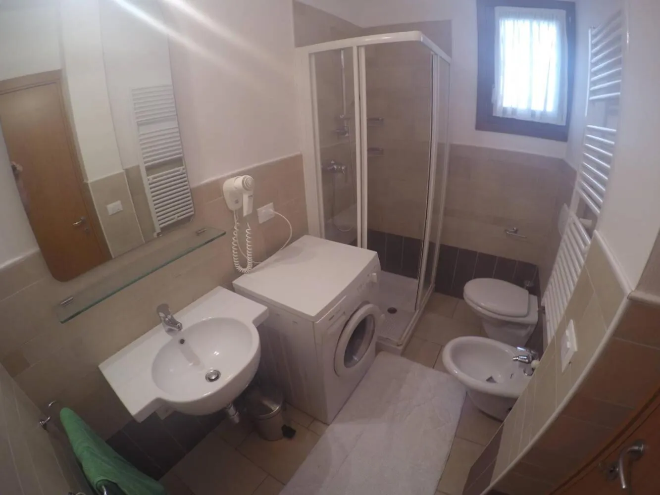 Bathroom in Residence Le Piramidi - Agenzia Cocal