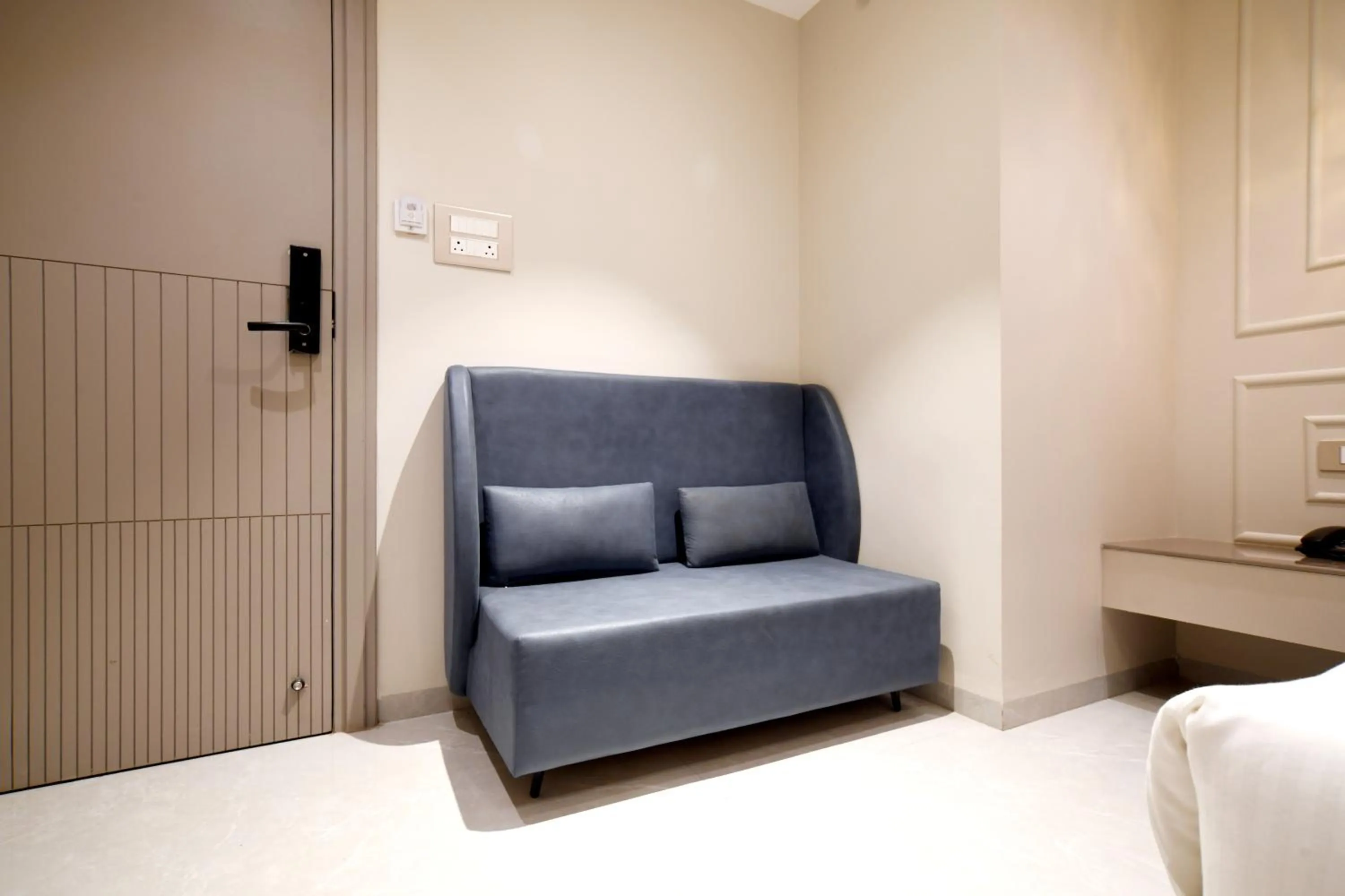Seating area, Bed in Aceotel Select Tulsi Vijay Nagar- A Luxury Boutique Hotel