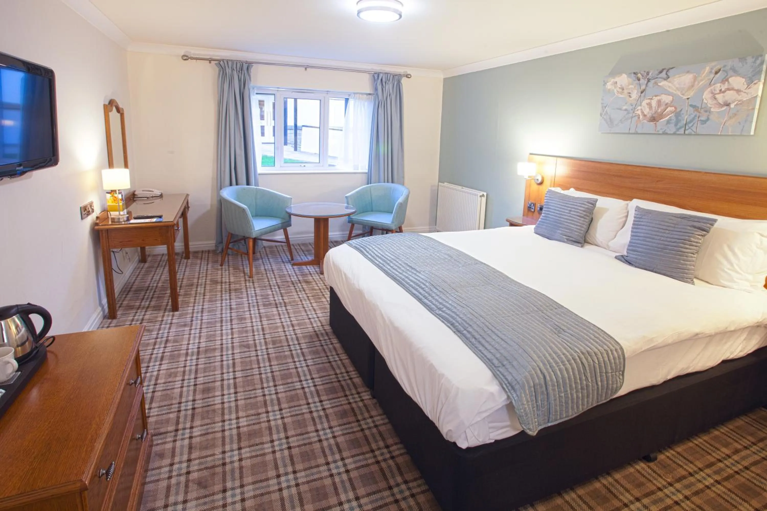 Bed in Last Drop Village Hotel & Spa