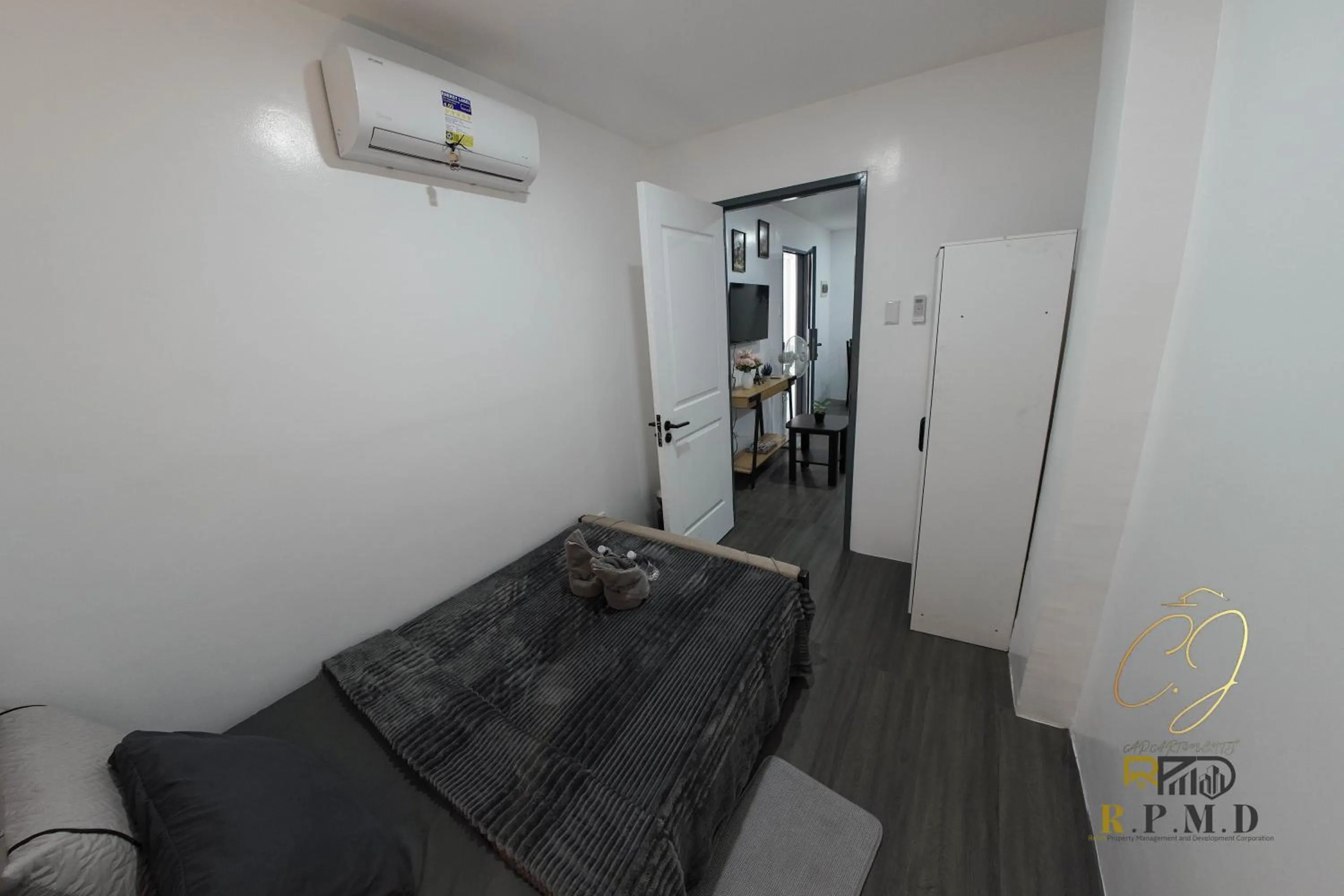 Bed in CJ Apartments