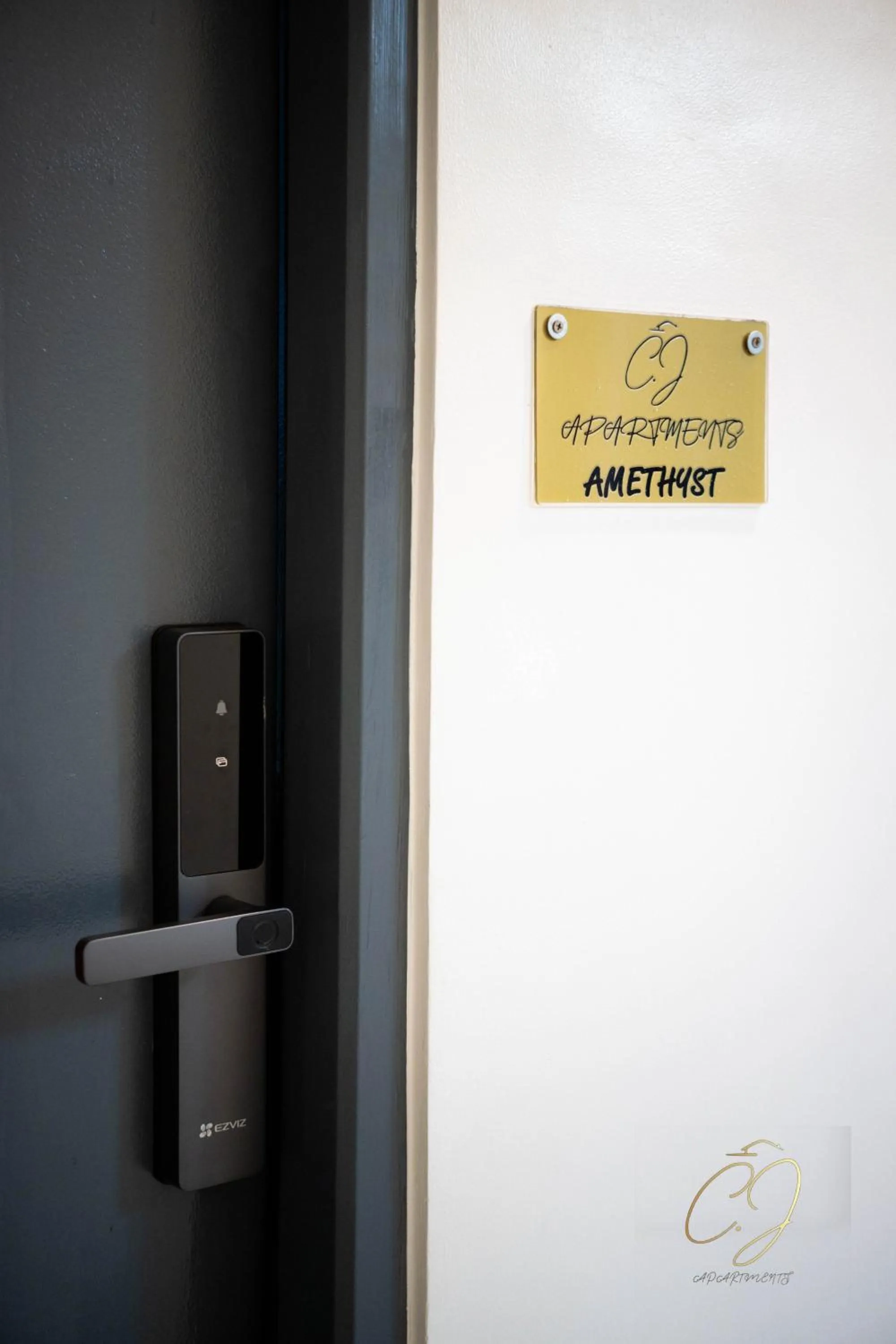 Property logo or sign in CJ Apartments