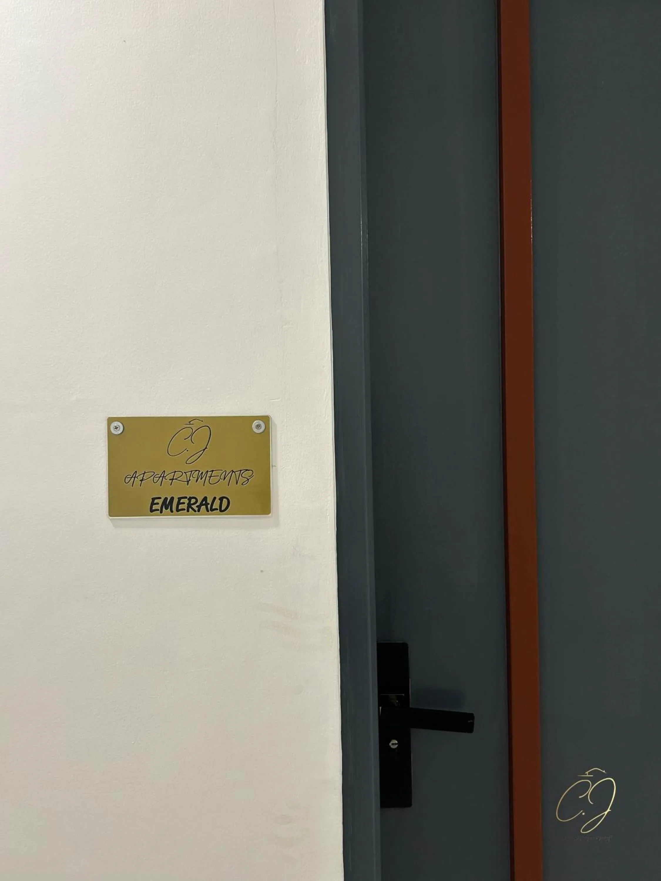 Property logo or sign in CJ Apartments