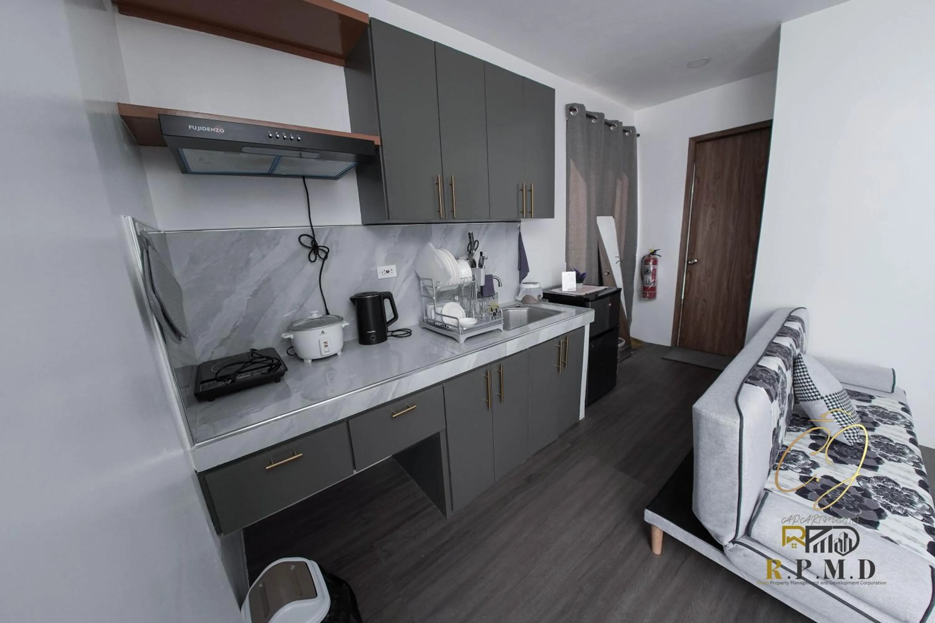 Kitchen or kitchenette in CJ Apartments
