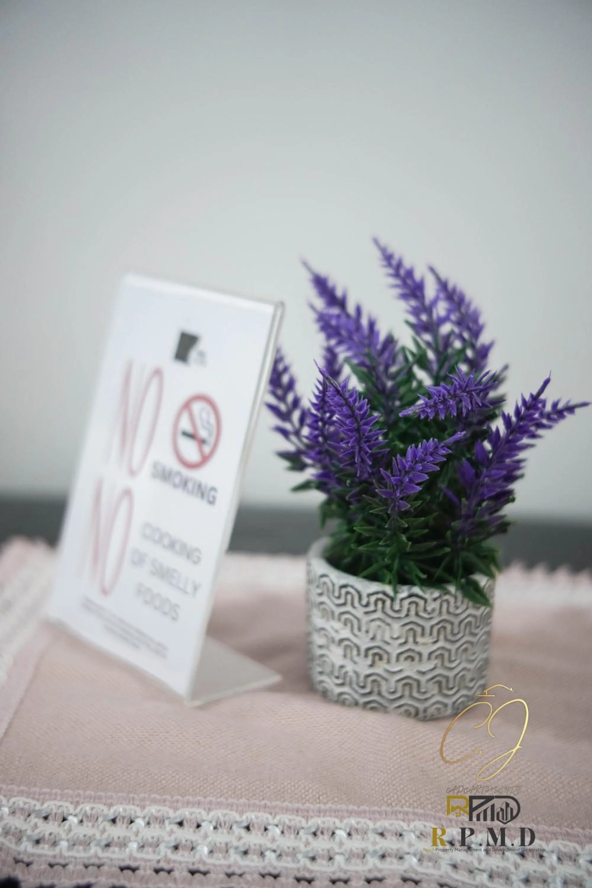 Property logo or sign in CJ Apartments