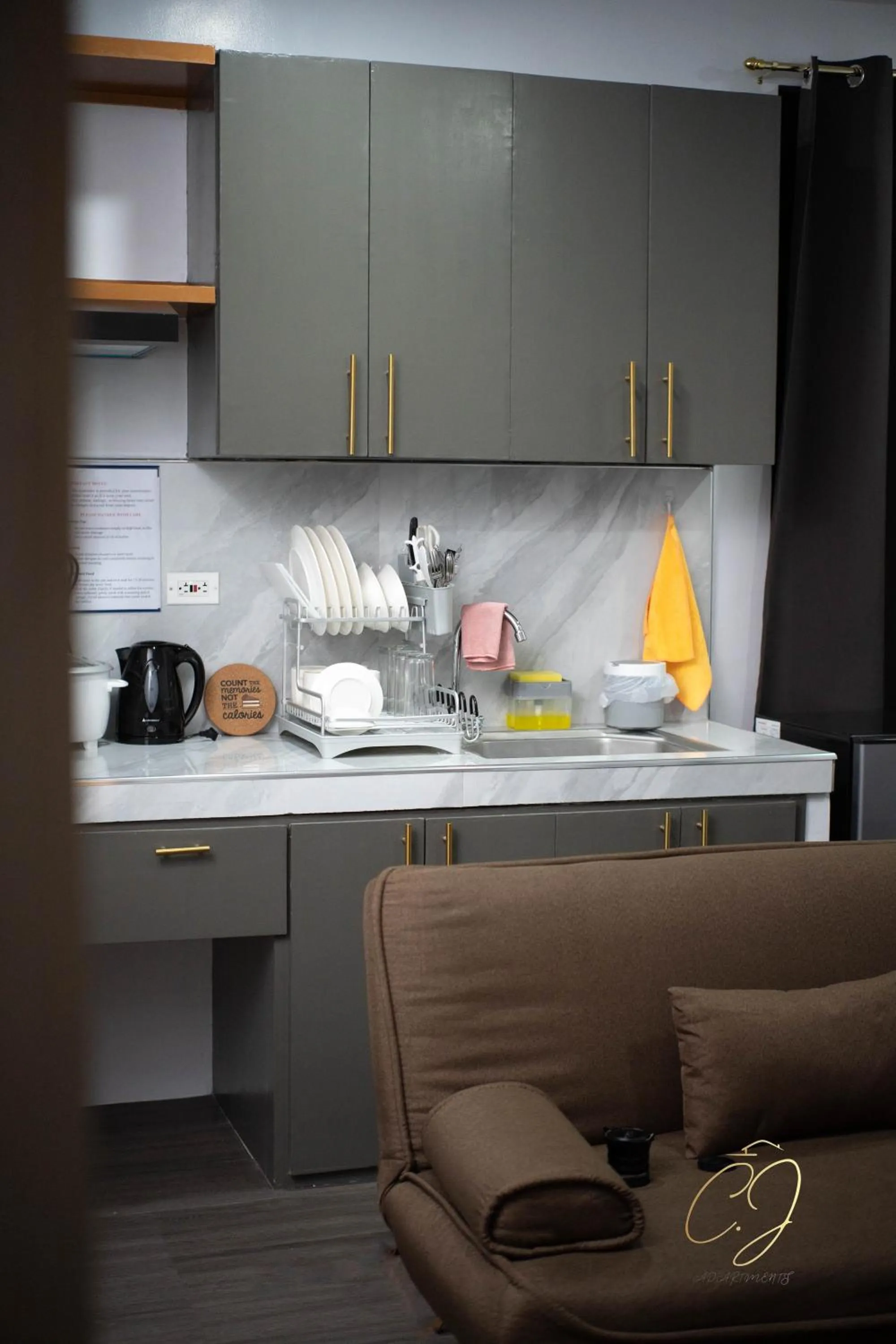 Kitchen or kitchenette in CJ Apartments