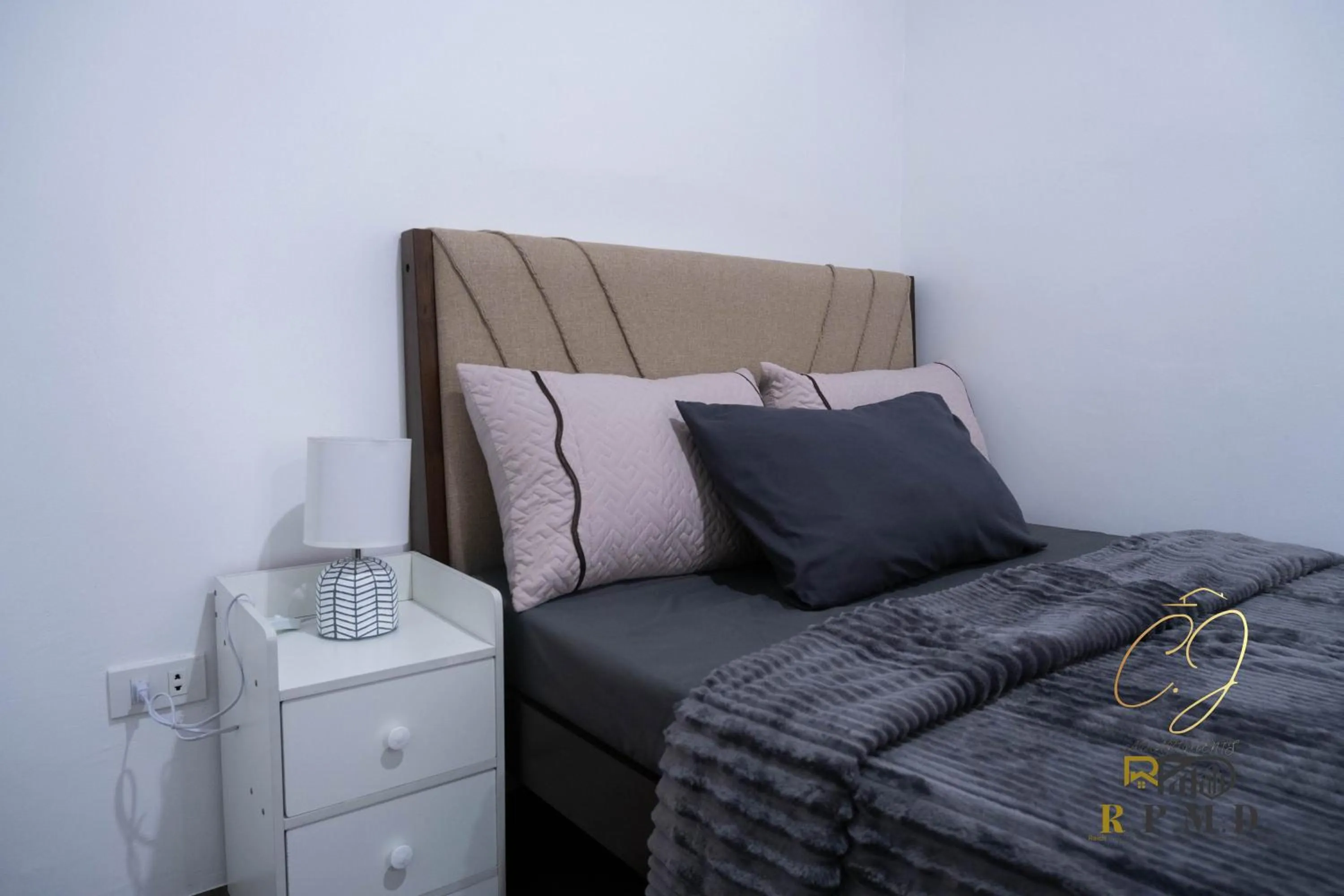 Bed in CJ Apartments