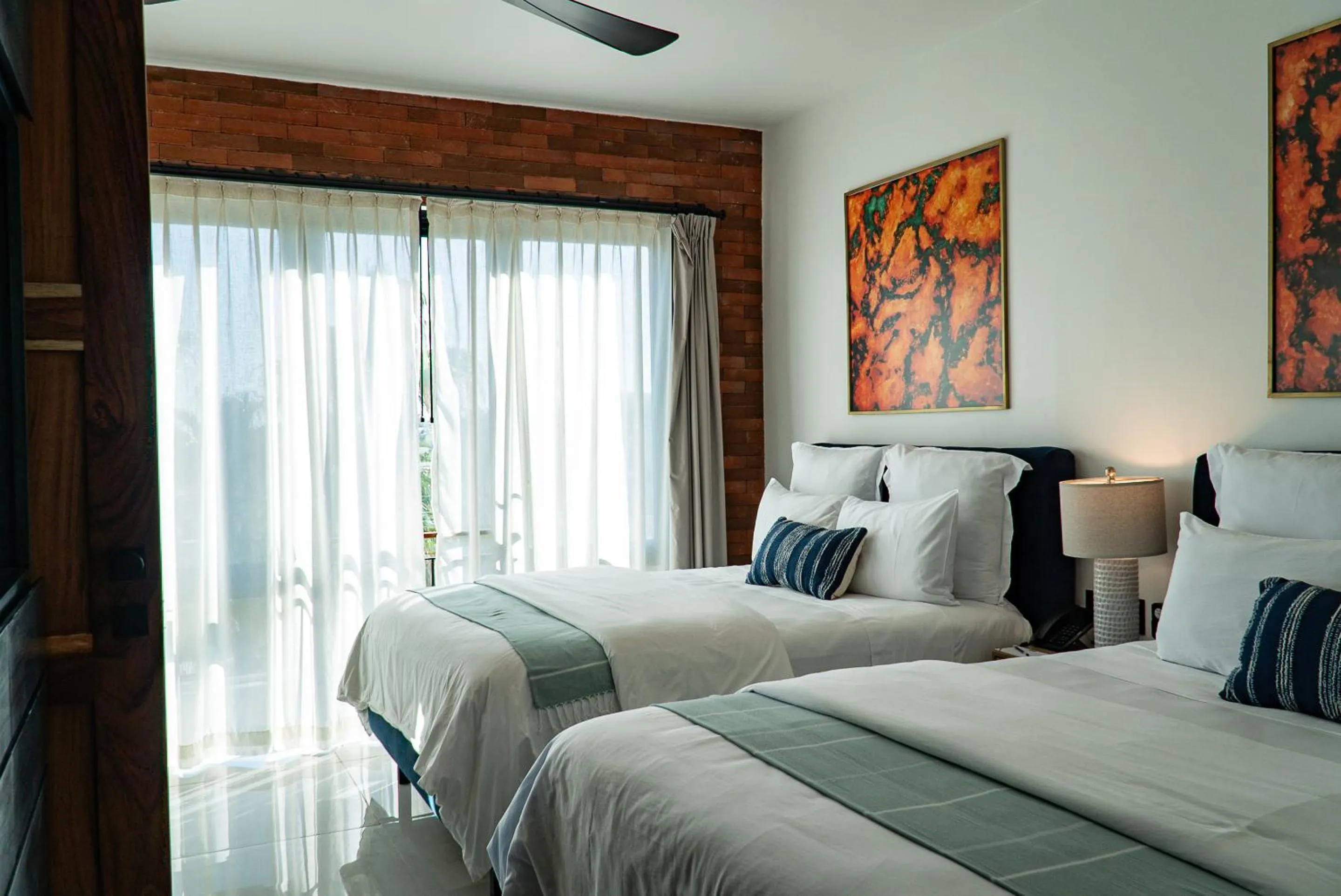 Bed in Flamboyan Hotel & Residences