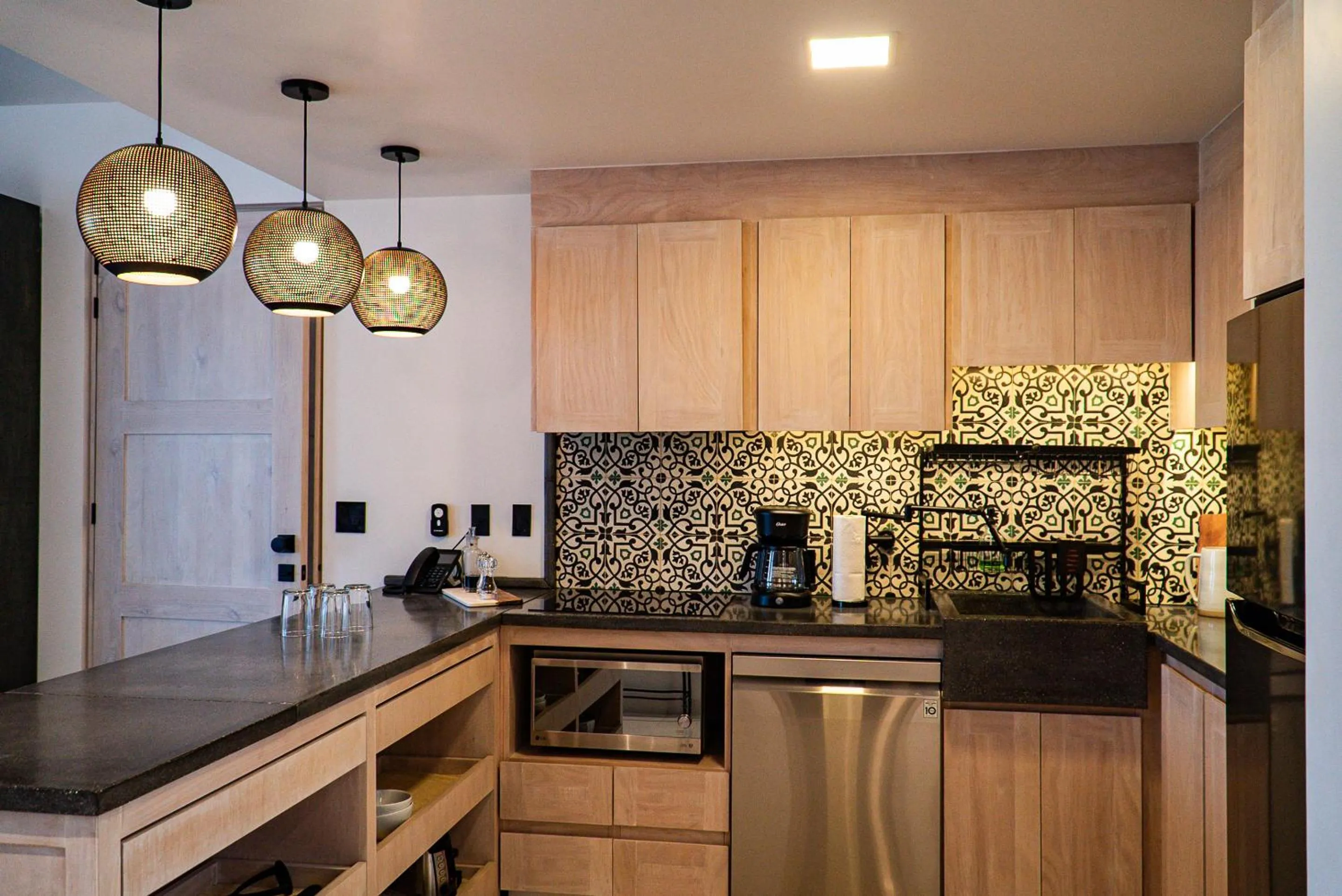 Kitchen or kitchenette in Flamboyan Hotel & Residences