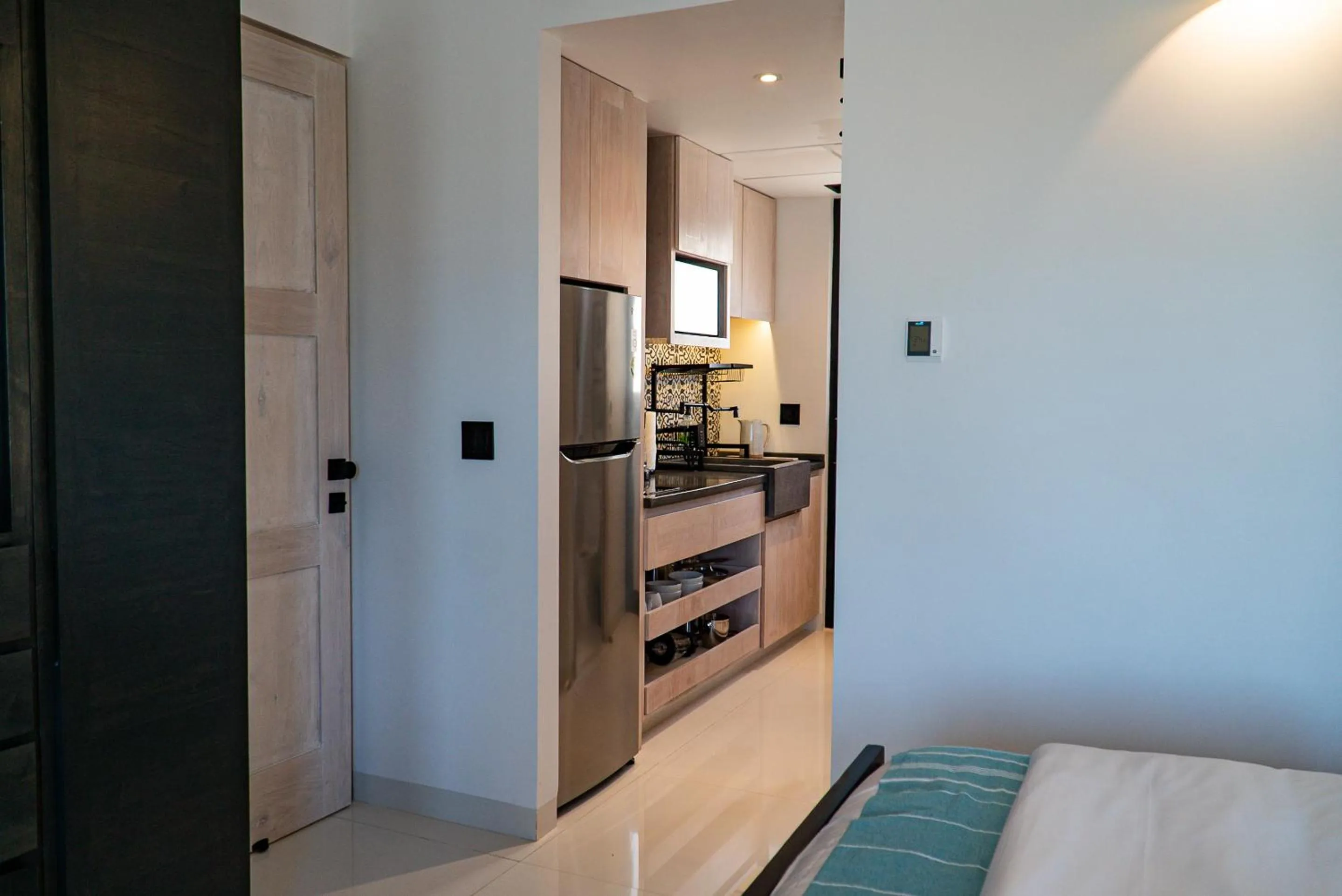 Kitchen or kitchenette in Flamboyan Hotel & Residences