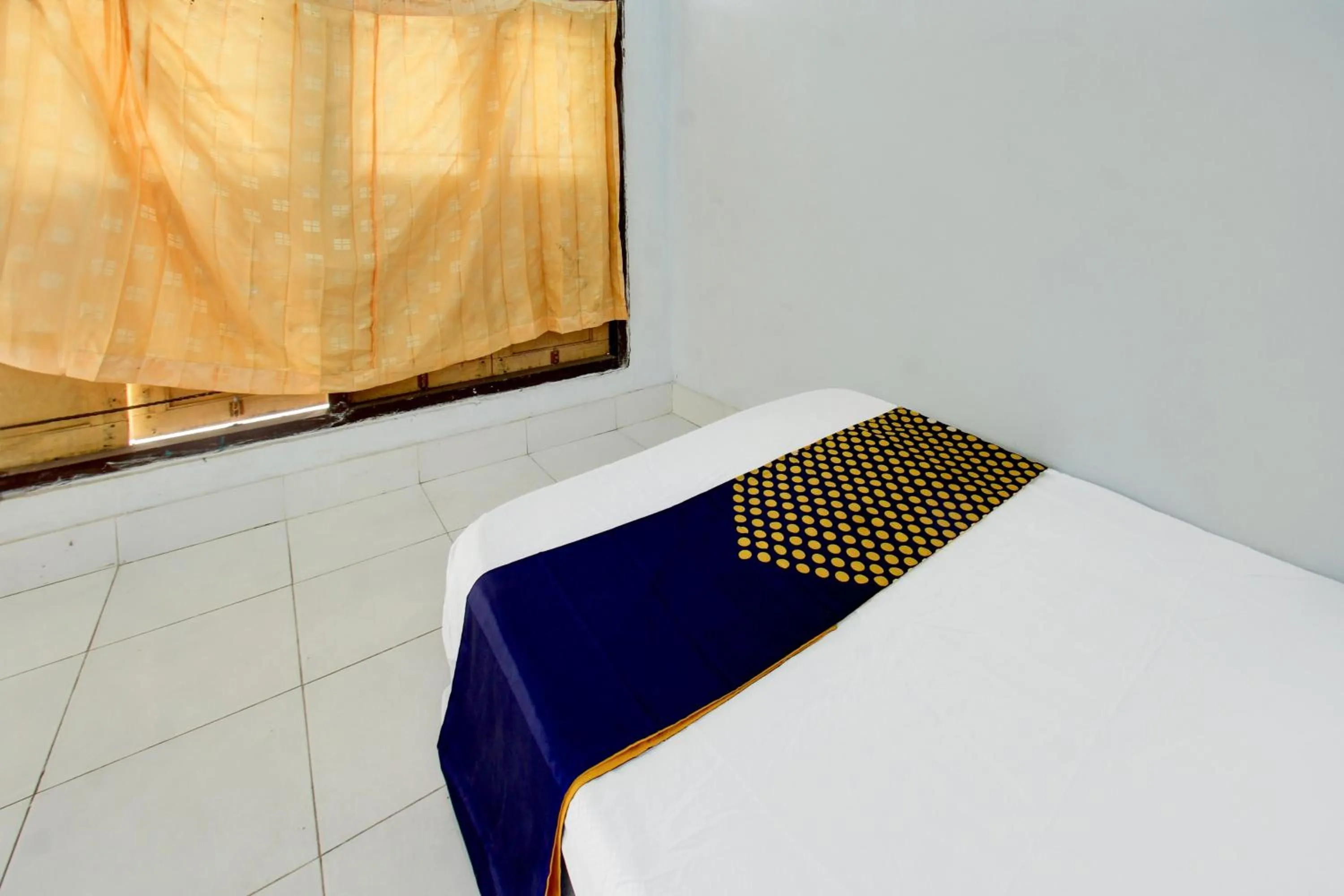 Bedroom in OYO Life 93015 Kos Anto