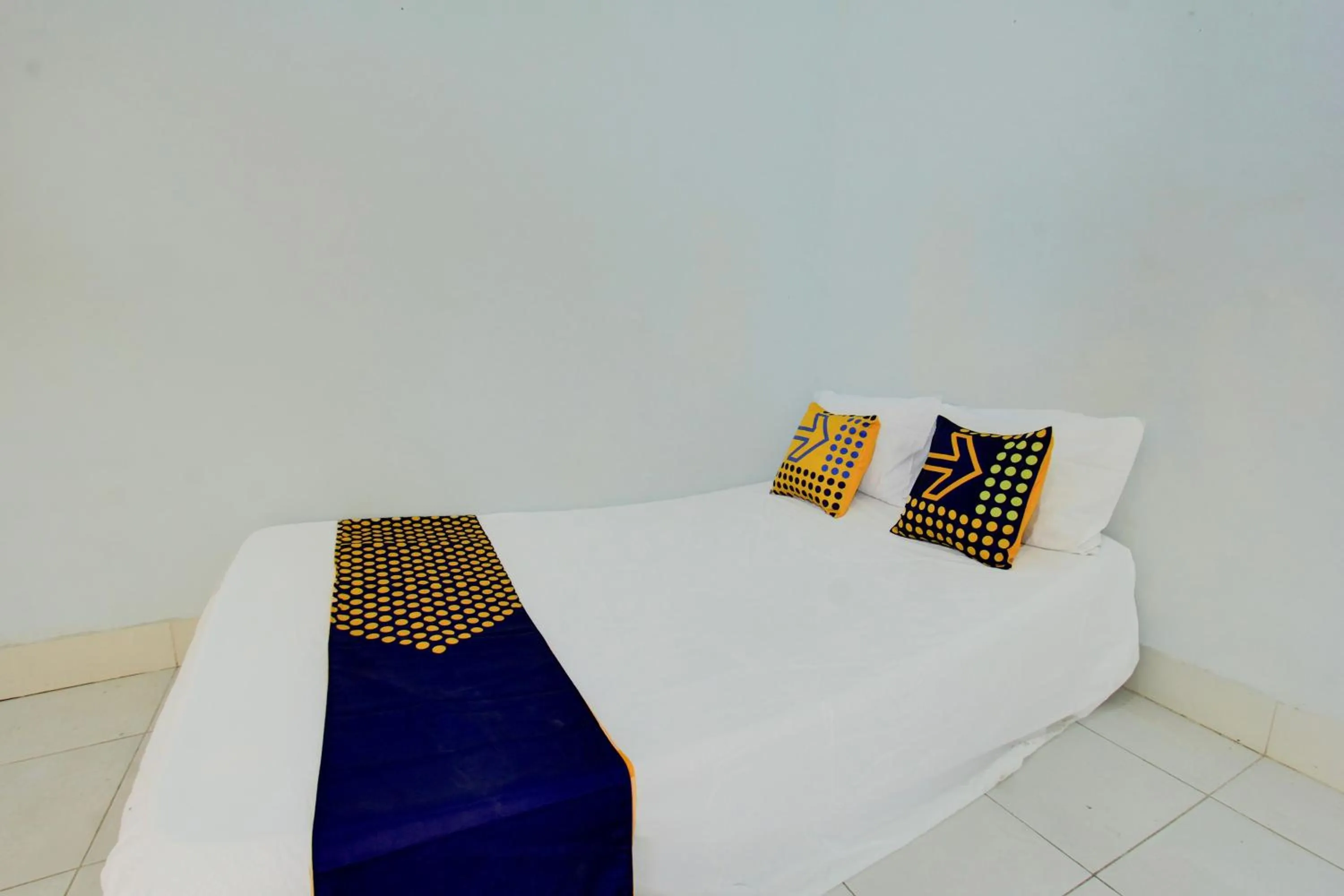 Bedroom in OYO Life 93015 Kos Anto