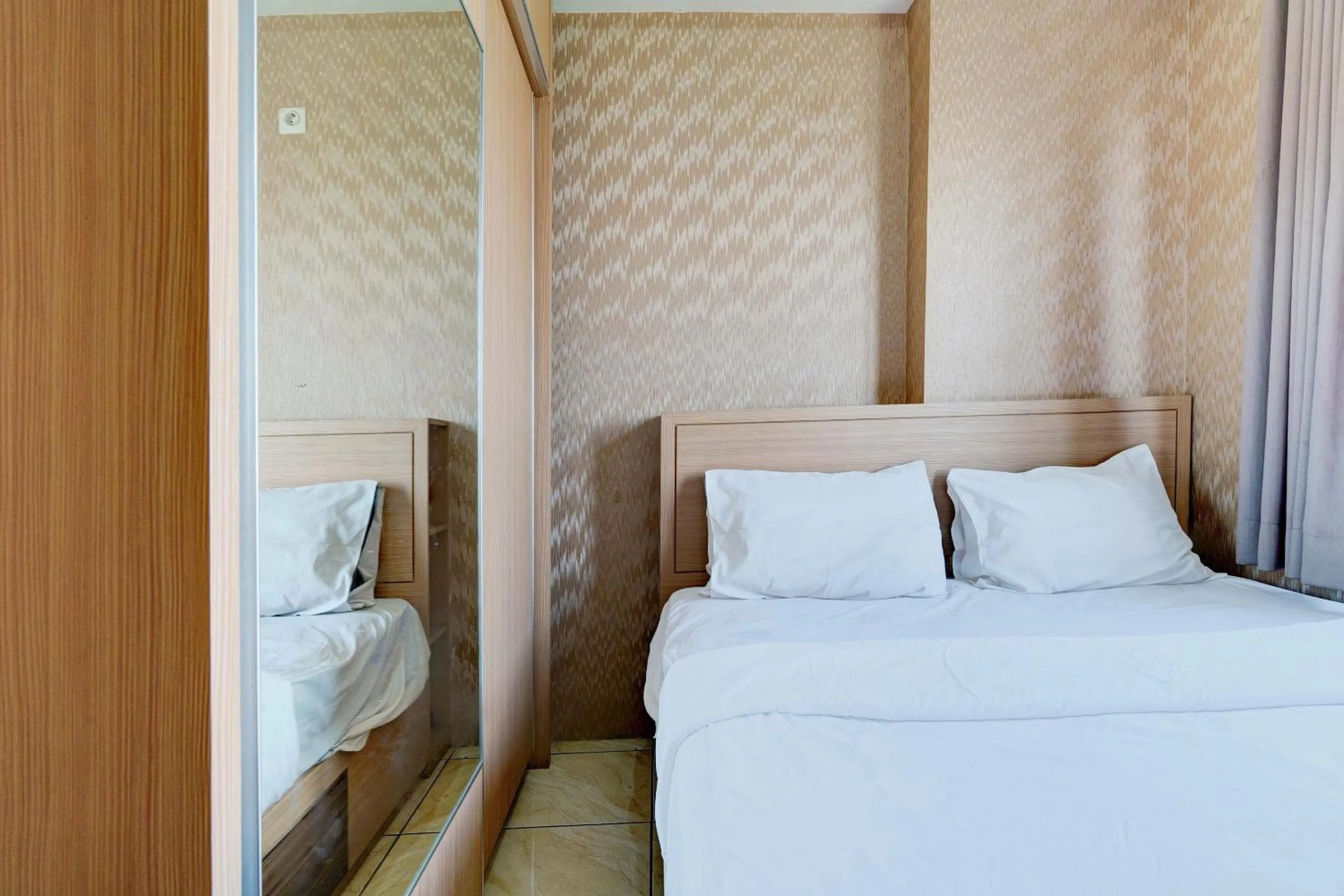 Bedroom, Bed in OYO Life 93310 Apartemen Tamansari Panoramic By Santuy 2