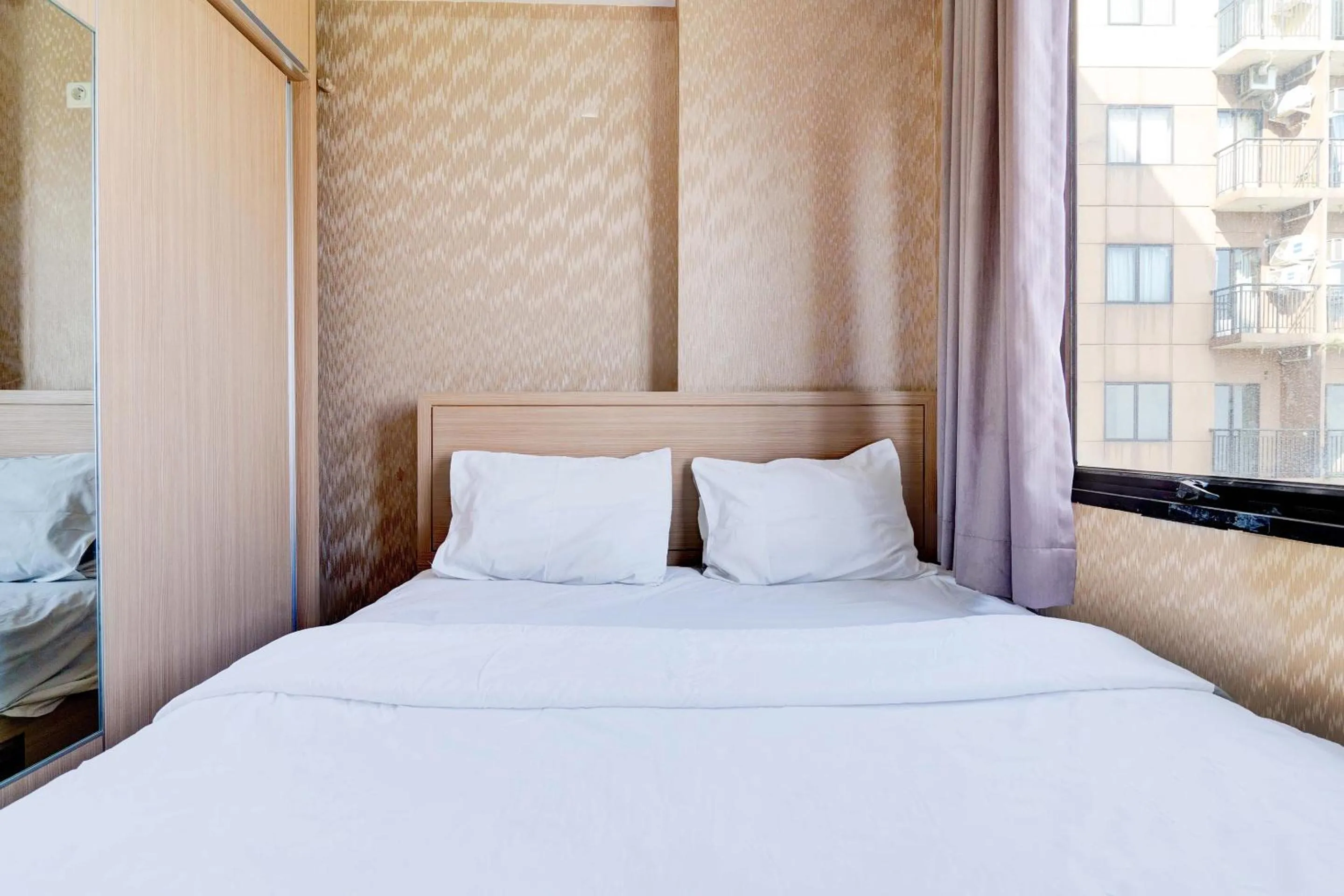 Bedroom, Bed in OYO Life 93310 Apartemen Tamansari Panoramic By Santuy 2