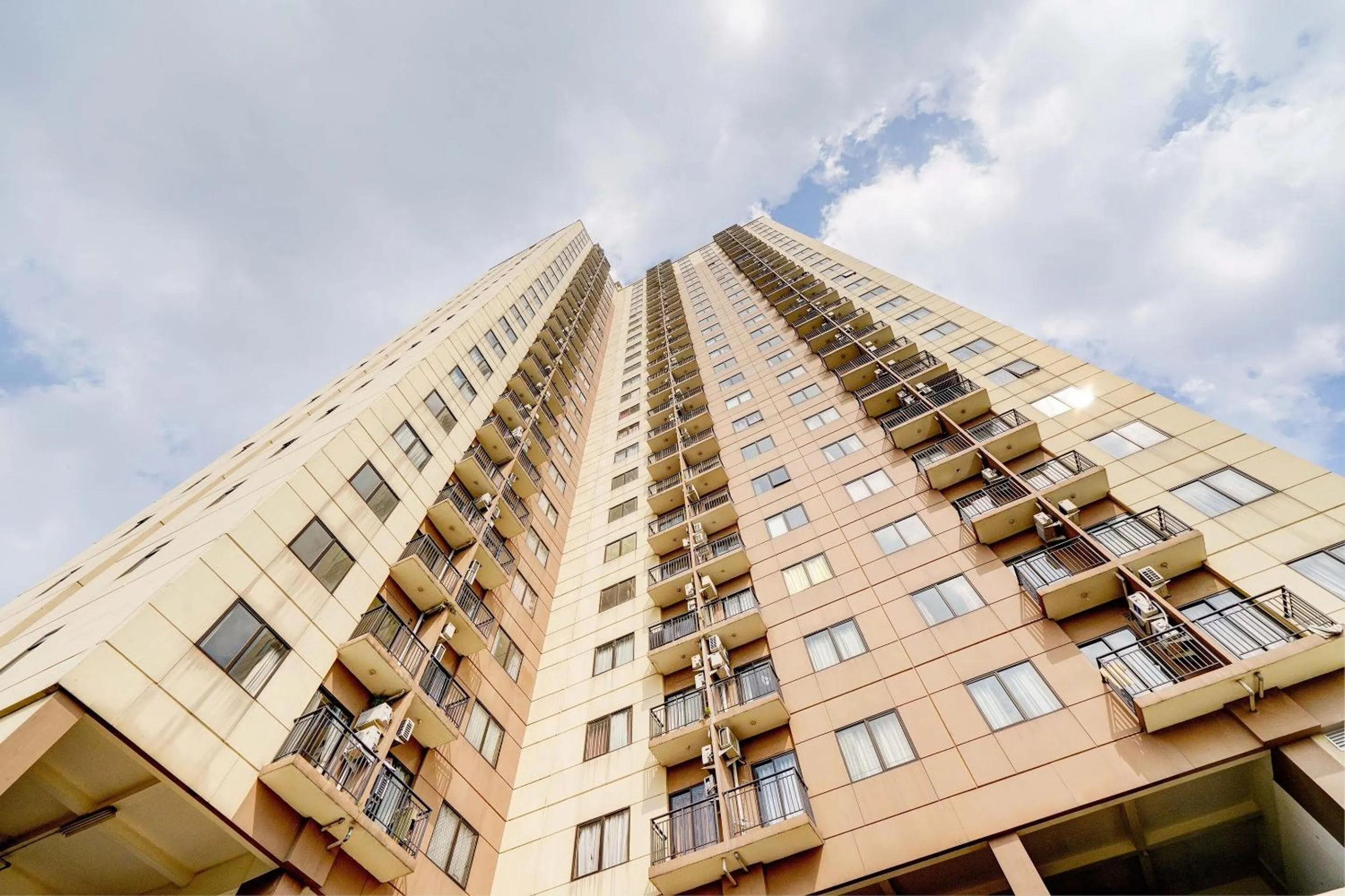 Facade/entrance in OYO Life 93310 Apartemen Tamansari Panoramic By Santuy 2