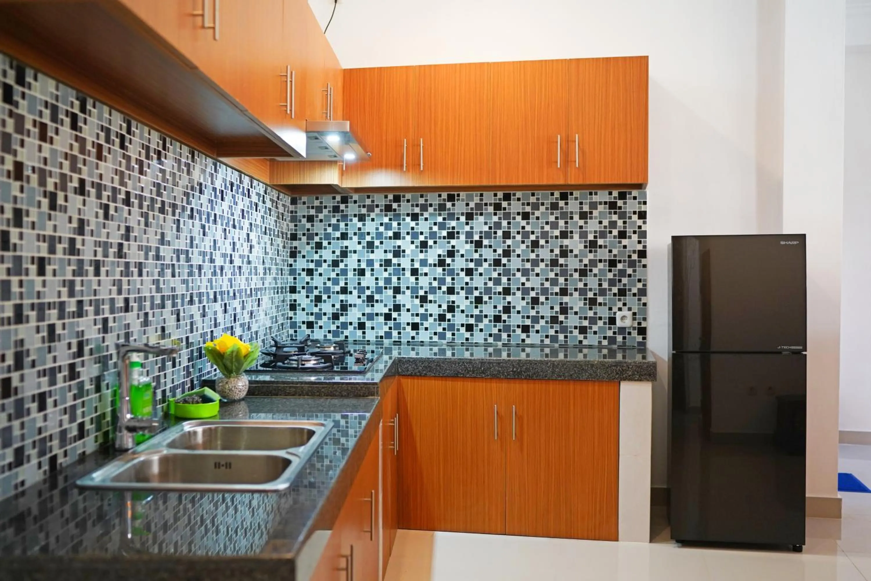 Communal kitchen in Lebak Bali Residence